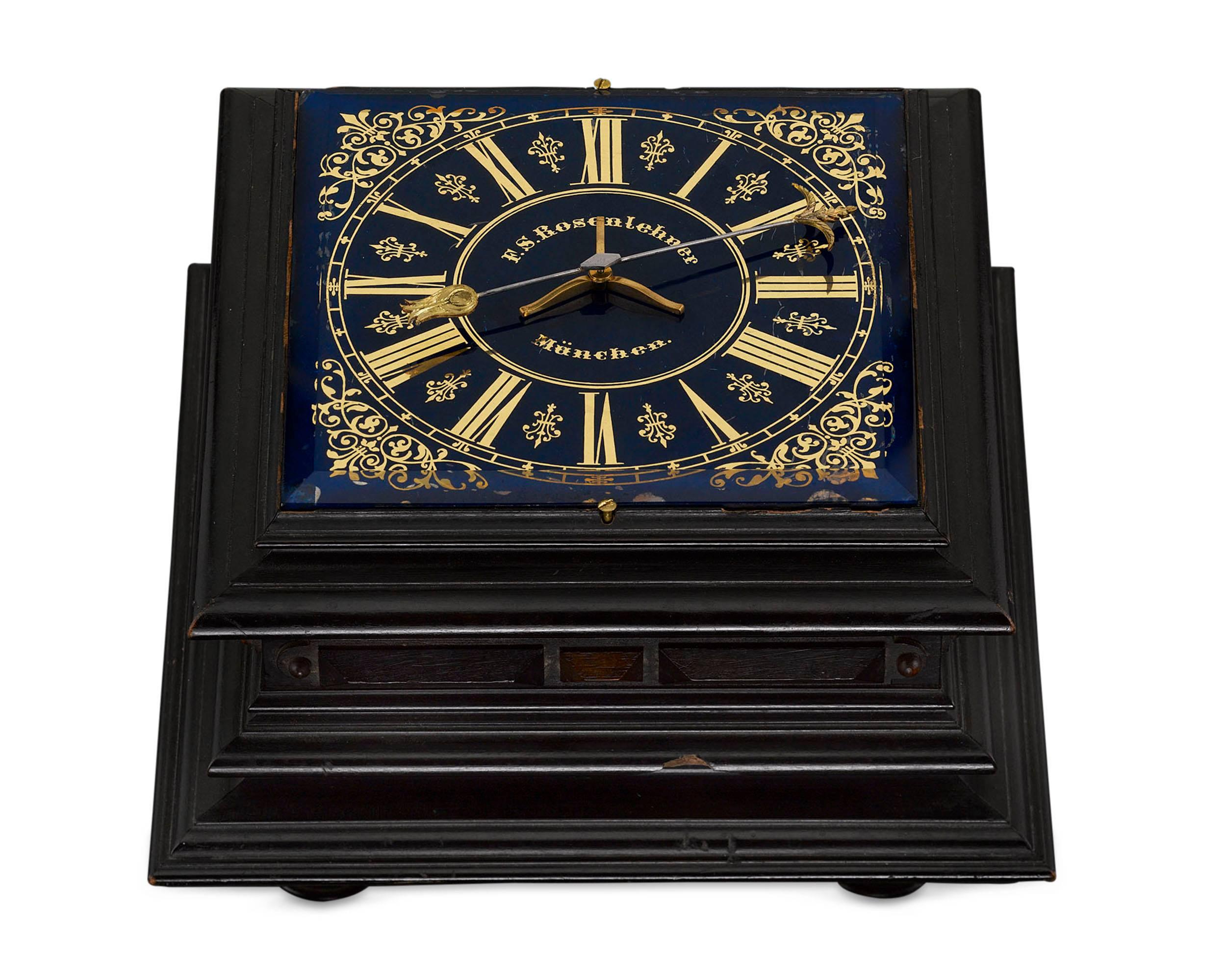 An incredibly rare 19th century horizontal table mystery clock with single hand by German clockmaker F.S. Rosenlehner of Munich. This fascinating antique timepiece features a free wielding hand that rotates upon a fixed point in the centre of a