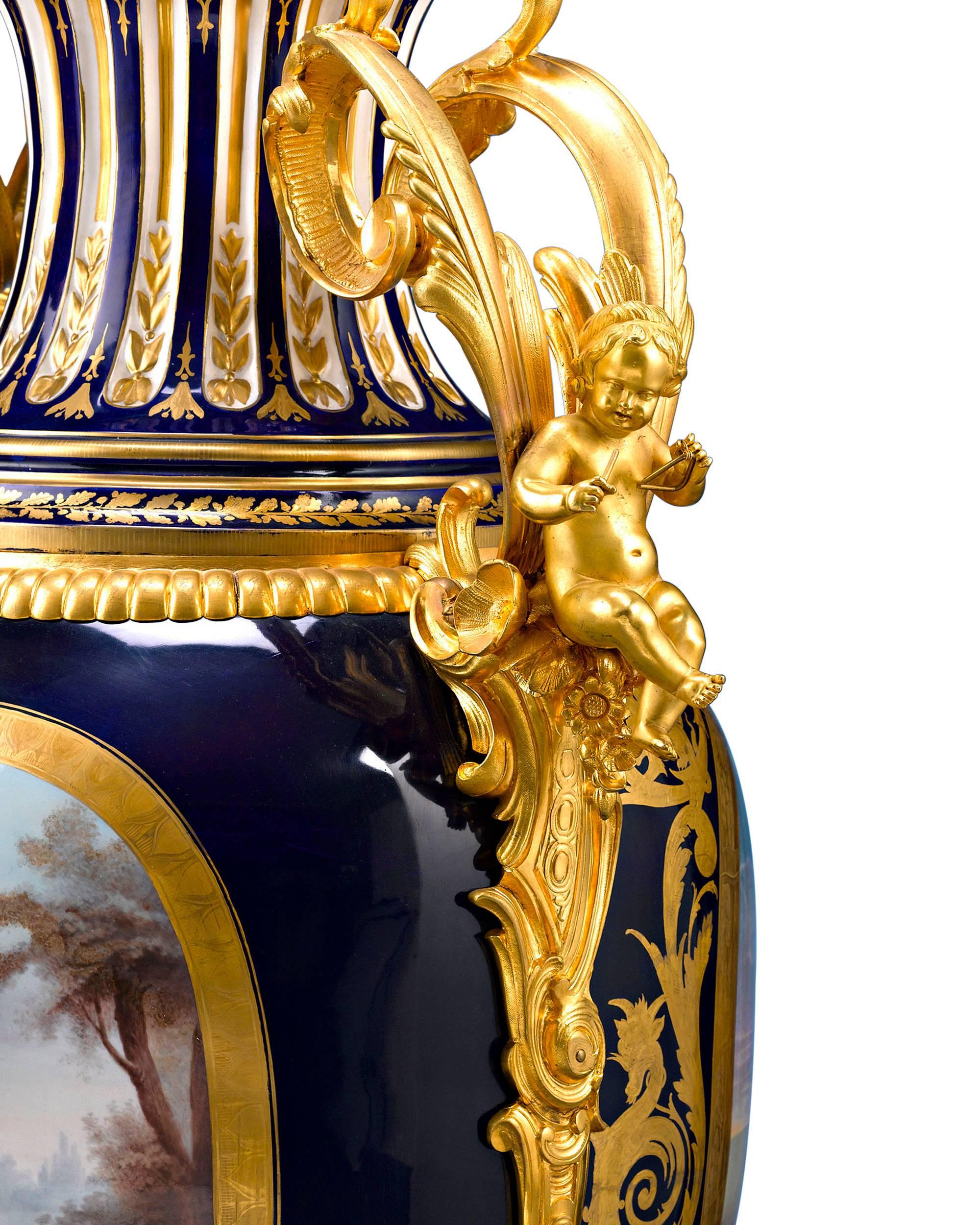 Hand-Painted Sèvres Palace Porcelain Urns For Sale