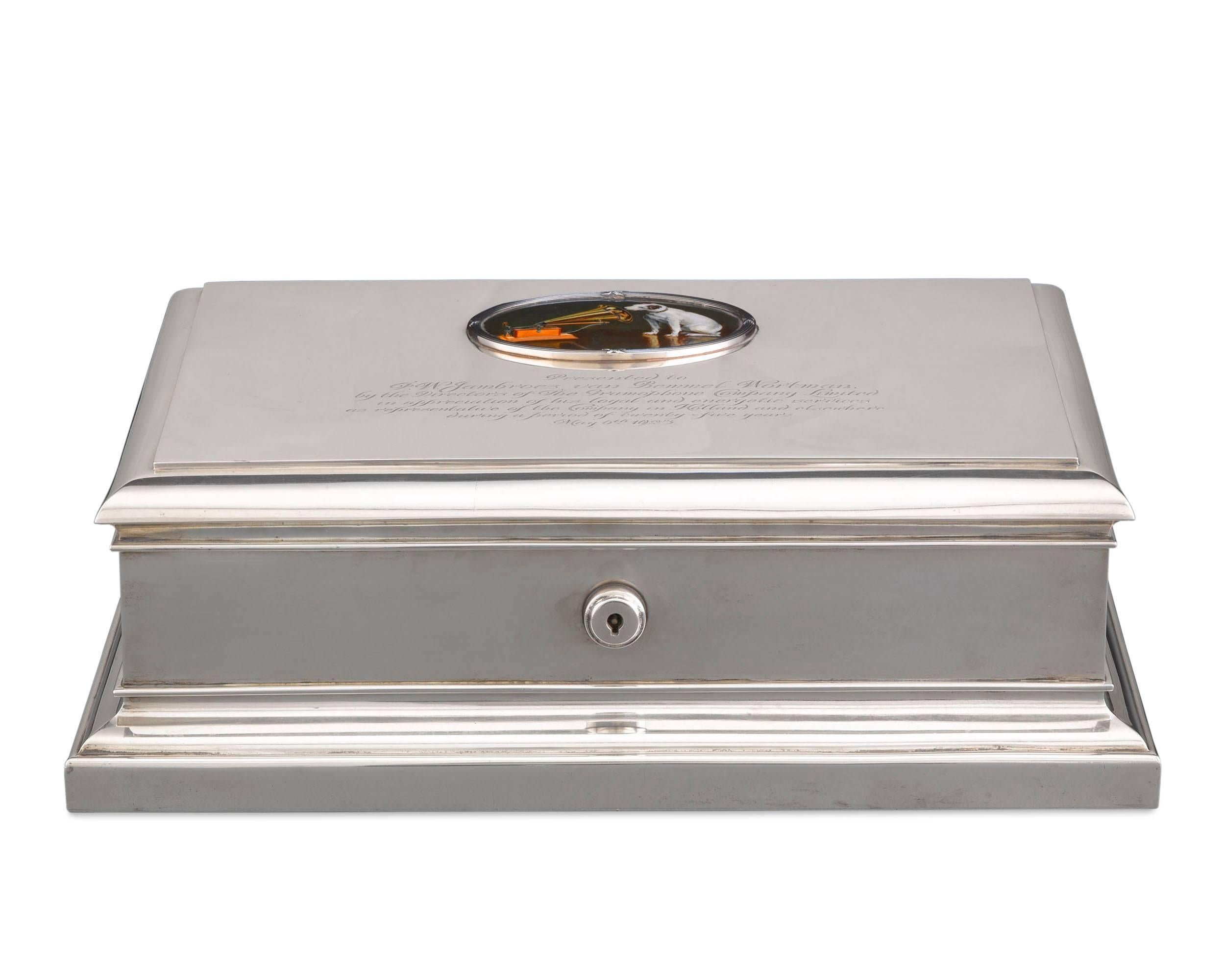 An exceptional and rare English silver cigar box by the Goldsmiths and Silversmiths Company, presented by The Gramophone Company Limited of Great Britain to Frederick Willem Jambroes van Bemmel Wortman, director of the company’s Netherlands and