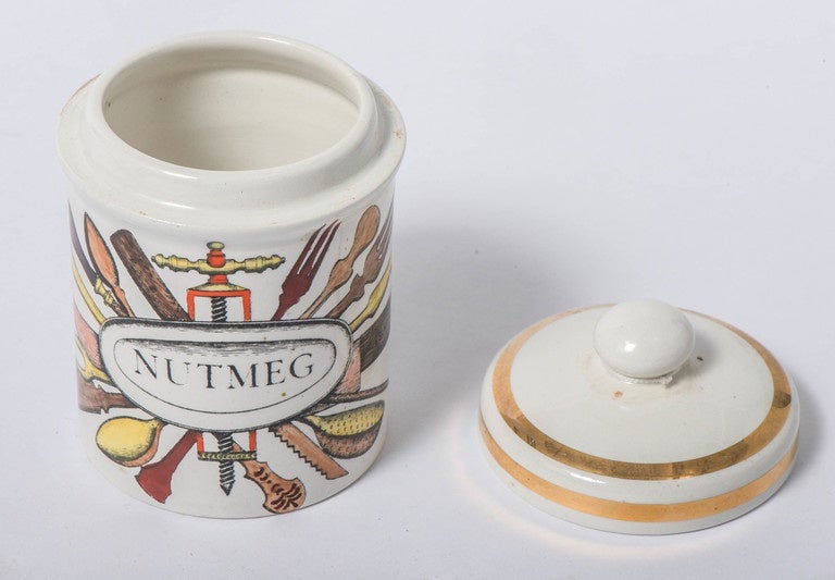 An early Fornasetti Porcelain Nutmeg Jar with cover, of cylinder form.
Lithographically printed and hand painted
Marks to base
Italy, circa 1960
12cm high x 7 cm diameter