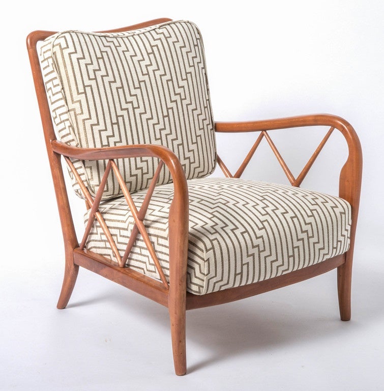 A pair of cherrywood armchairs in the style of Paolo Buffa.
The open tapering armrests fitted with sycamore diagonal trellis slats.
Tapering feet.
Italy, circa 1940.
Measures: 77cm high x 65 cm wide x 62 cm deep.