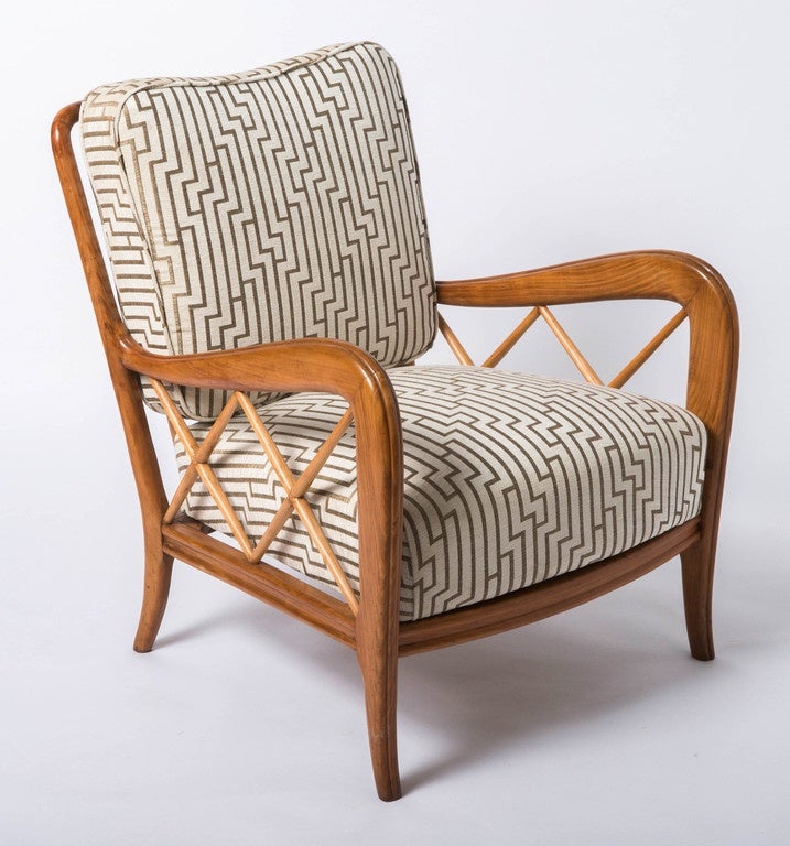 Pair of Cherrywood Armchairs in the style of Paolo Buffa.
The open tapering armrests fitted with sycamore diagonal trellis slats.
Tapering feet,
Italy, circa 1940.
Measures: 77 cm high x 65 cm wide x 62 cm deep.