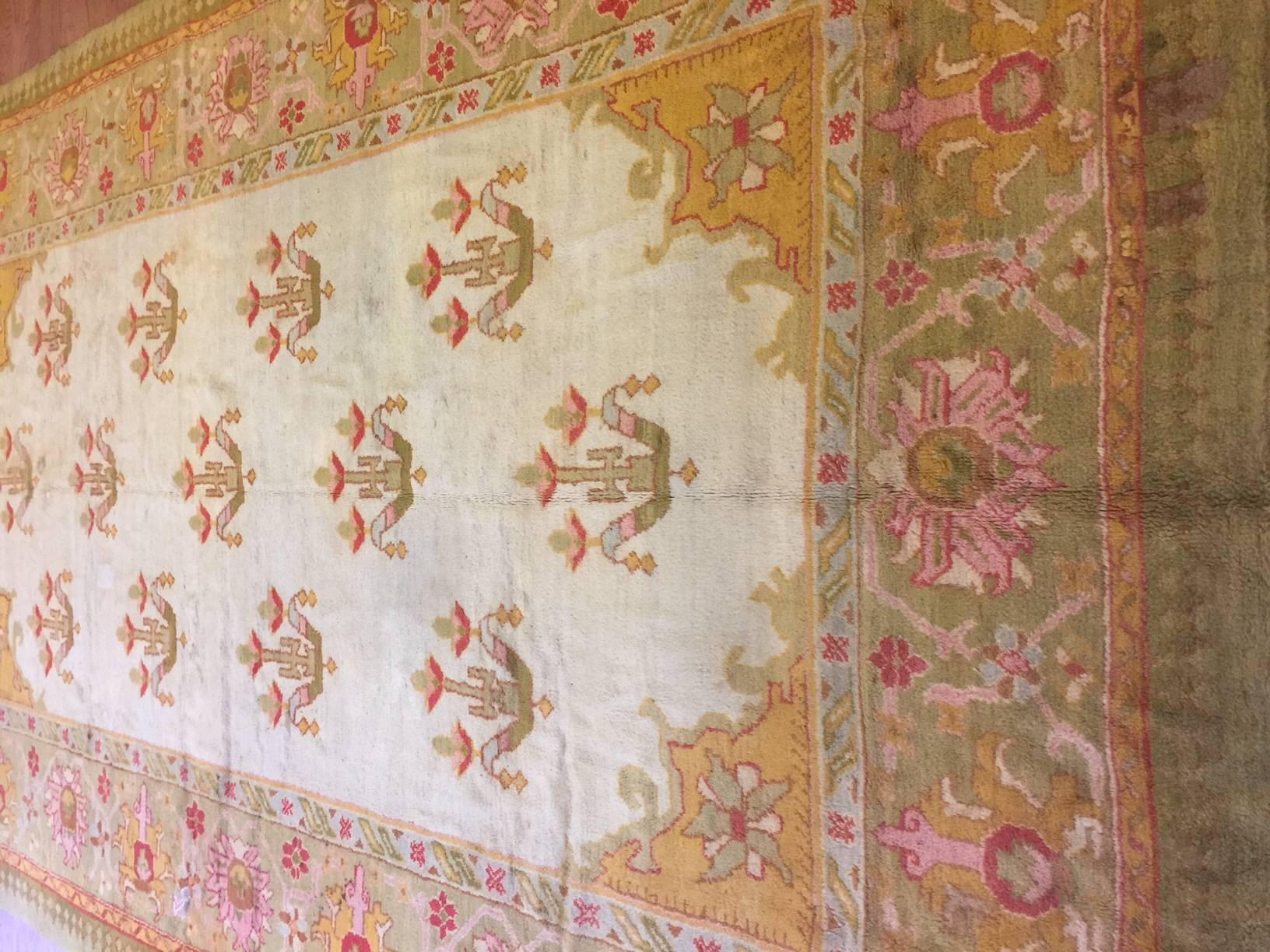 Antique Turkish Oushak rug. Contact dealer.