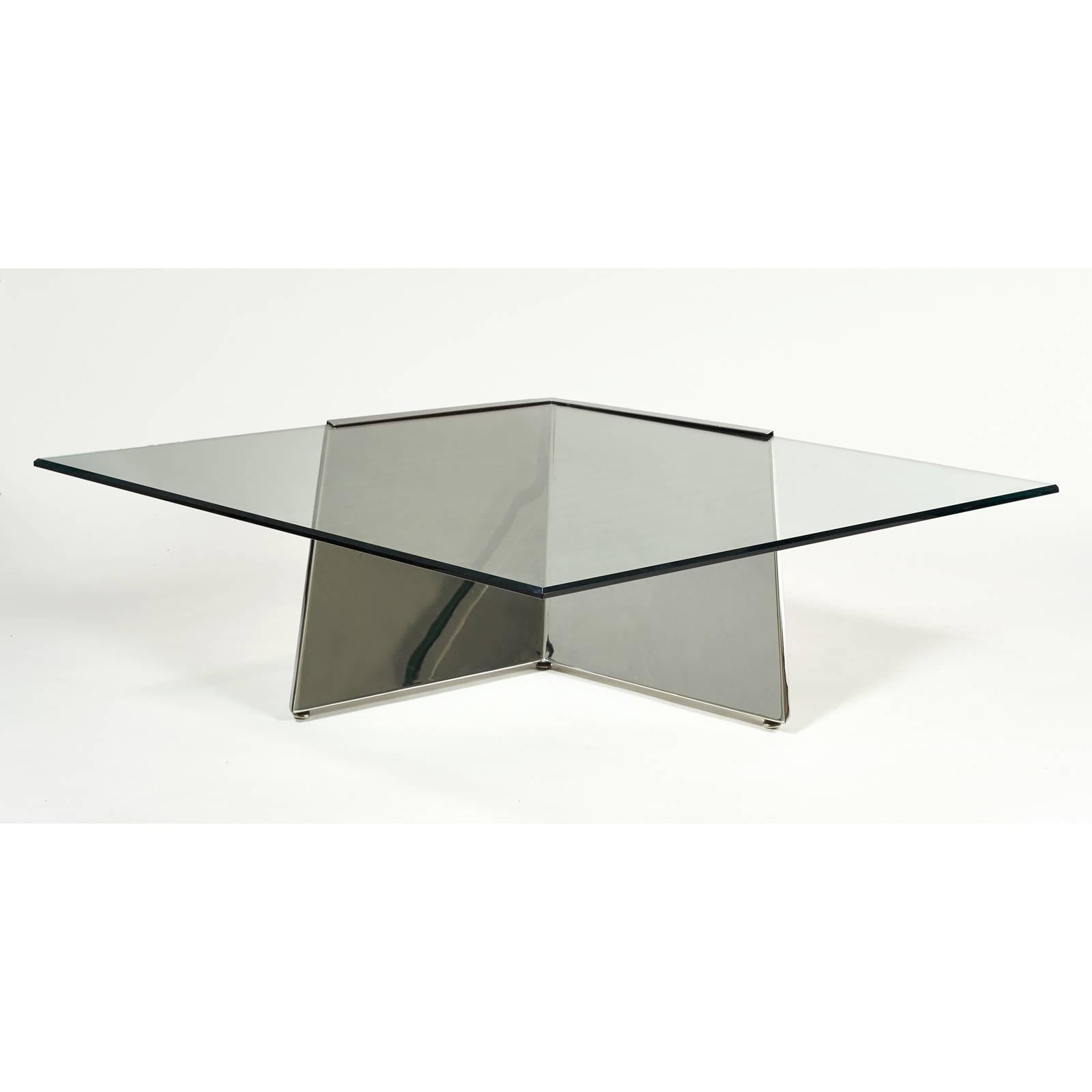 You are viewing a very unique cantilever coffee table by Brueton. (We have one more in another listing). First of all, its a real eyecatcher when someone walks into a living room. It seems to defy gravity. The piece is very heavy and substantial.