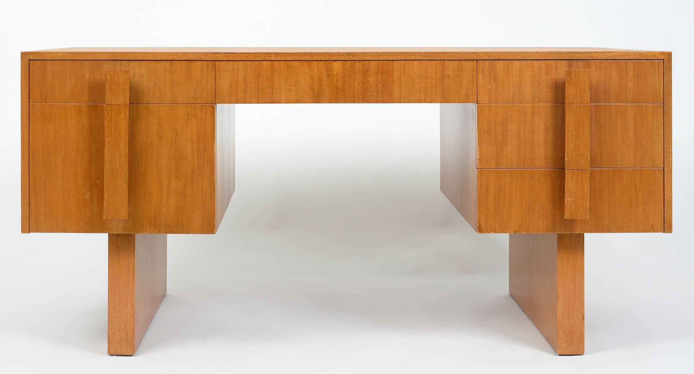 You are viewing a seldom seen VK Desk from the NYC showroom of Kagan-Dreyfuss, circa 1953. This desk exudes Cubism with sharp clean edges. The inside as well as the outside has aged beautifully. This desk has two drawers on the left, one center