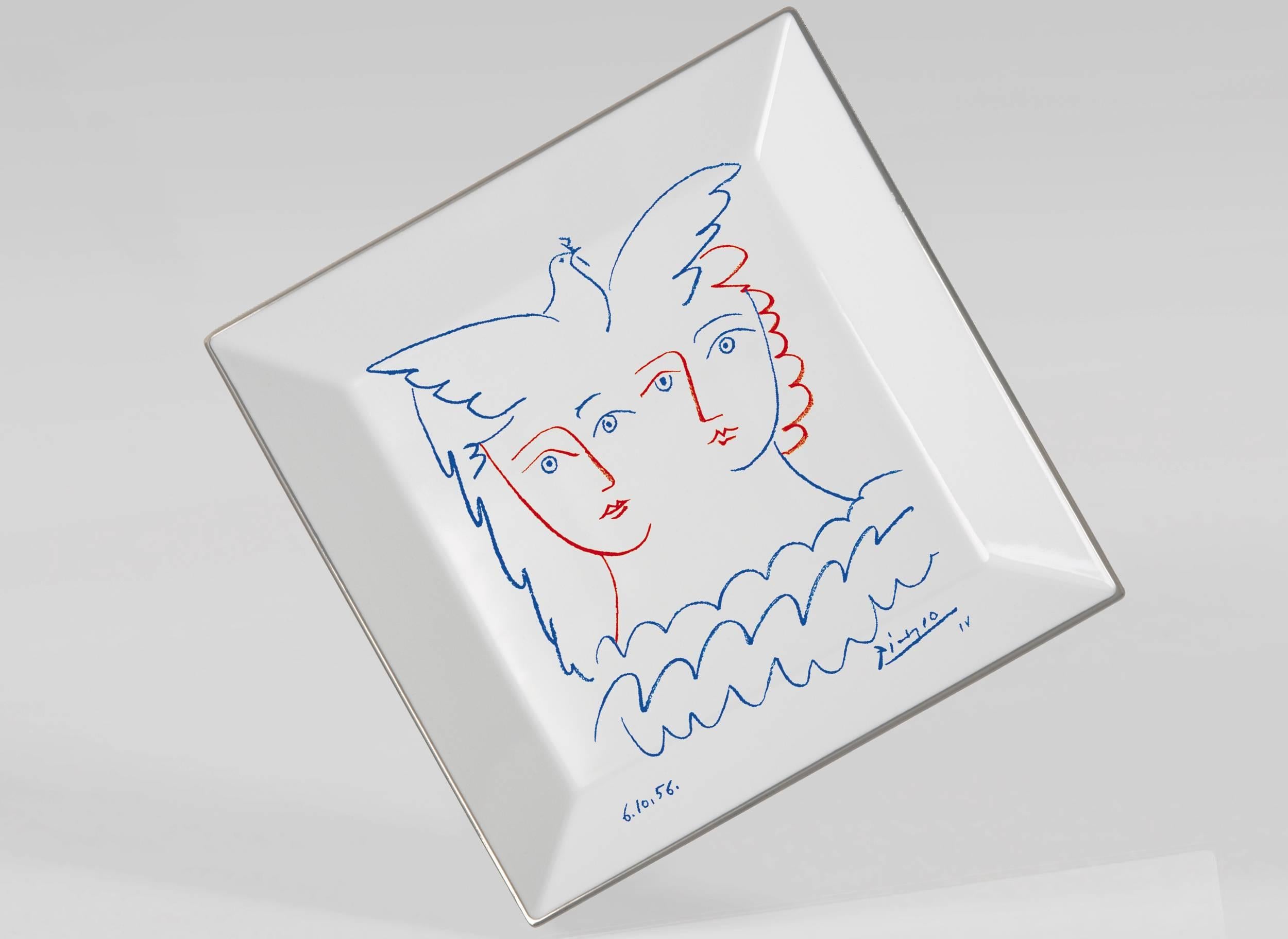 Pablo Picasso
Two women with dove plate
Porcelain from Limoges with silver trim
Measure: 10.6 x 10.6 inches
27 x 27 cm
Custom gift box

This square plate was made in collaboration with the artist's estate and features a reproduction of