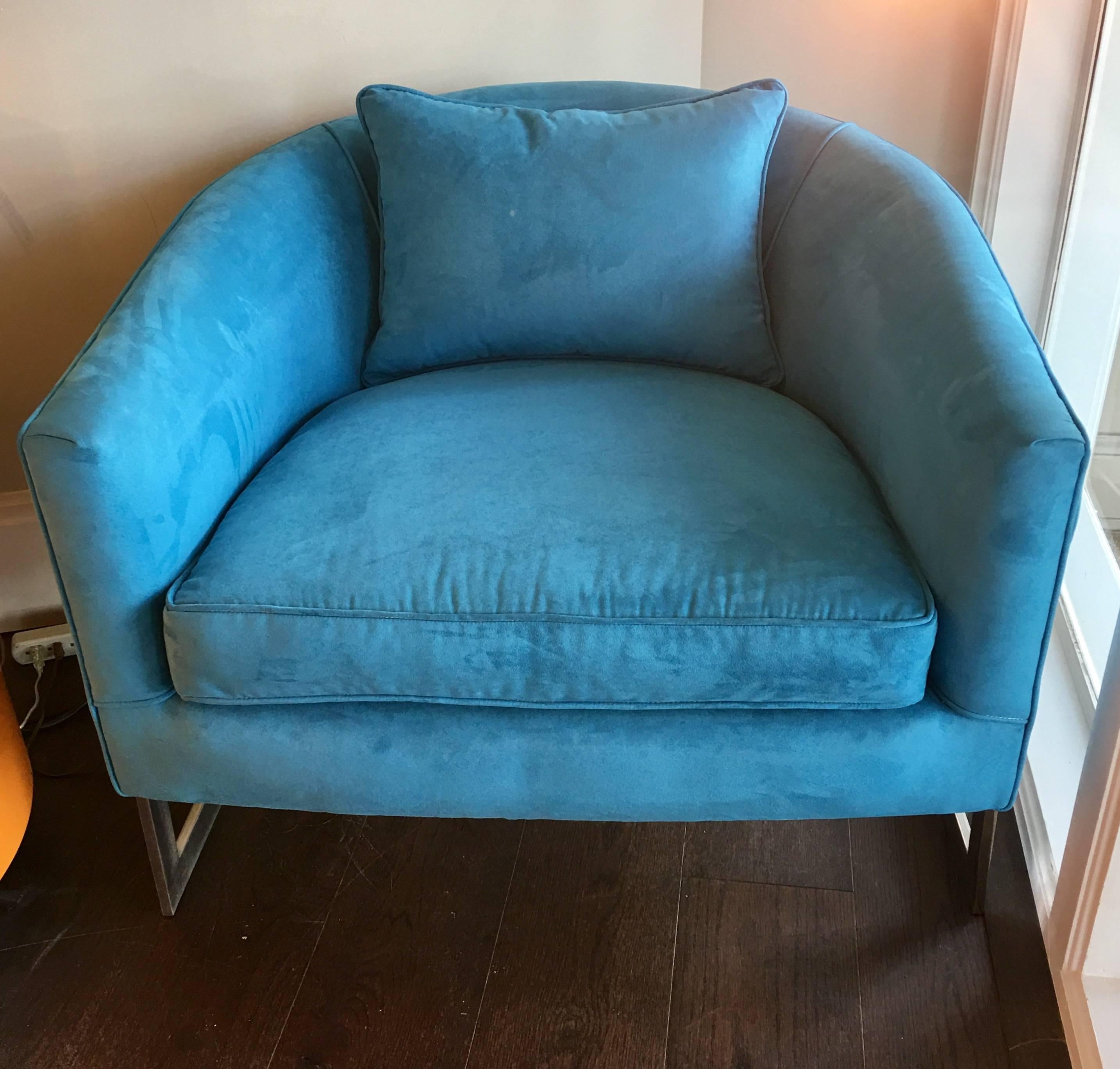 Gorgeous pair of heavy chrome barrel back chairs by Milo Baughman. Newly upholstered with beautiful aqua blue fabric, circa 1970s.