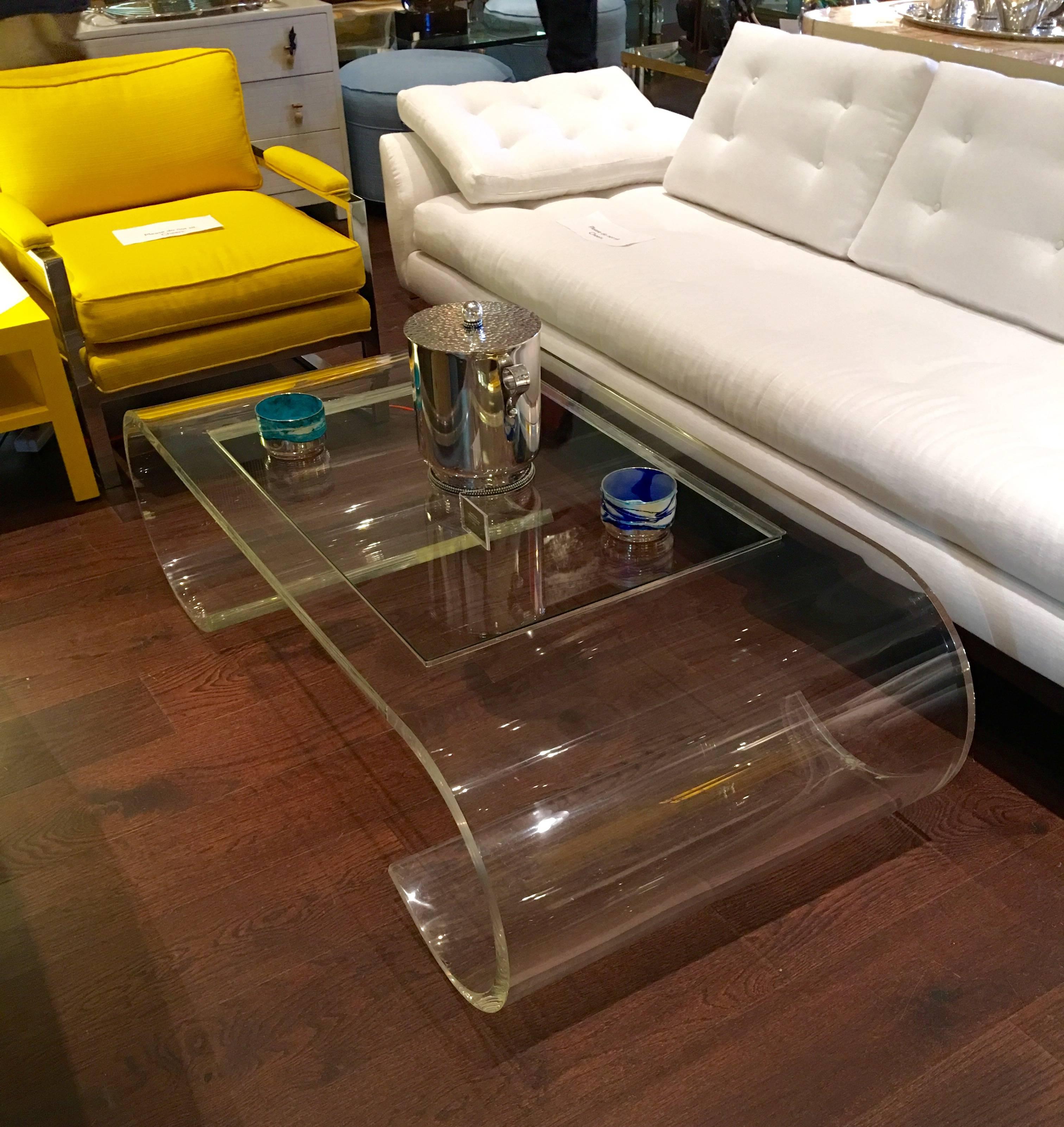 Extraordinary Lucite scroll coffee table with glass top in the style of Charles Hollis Jones.