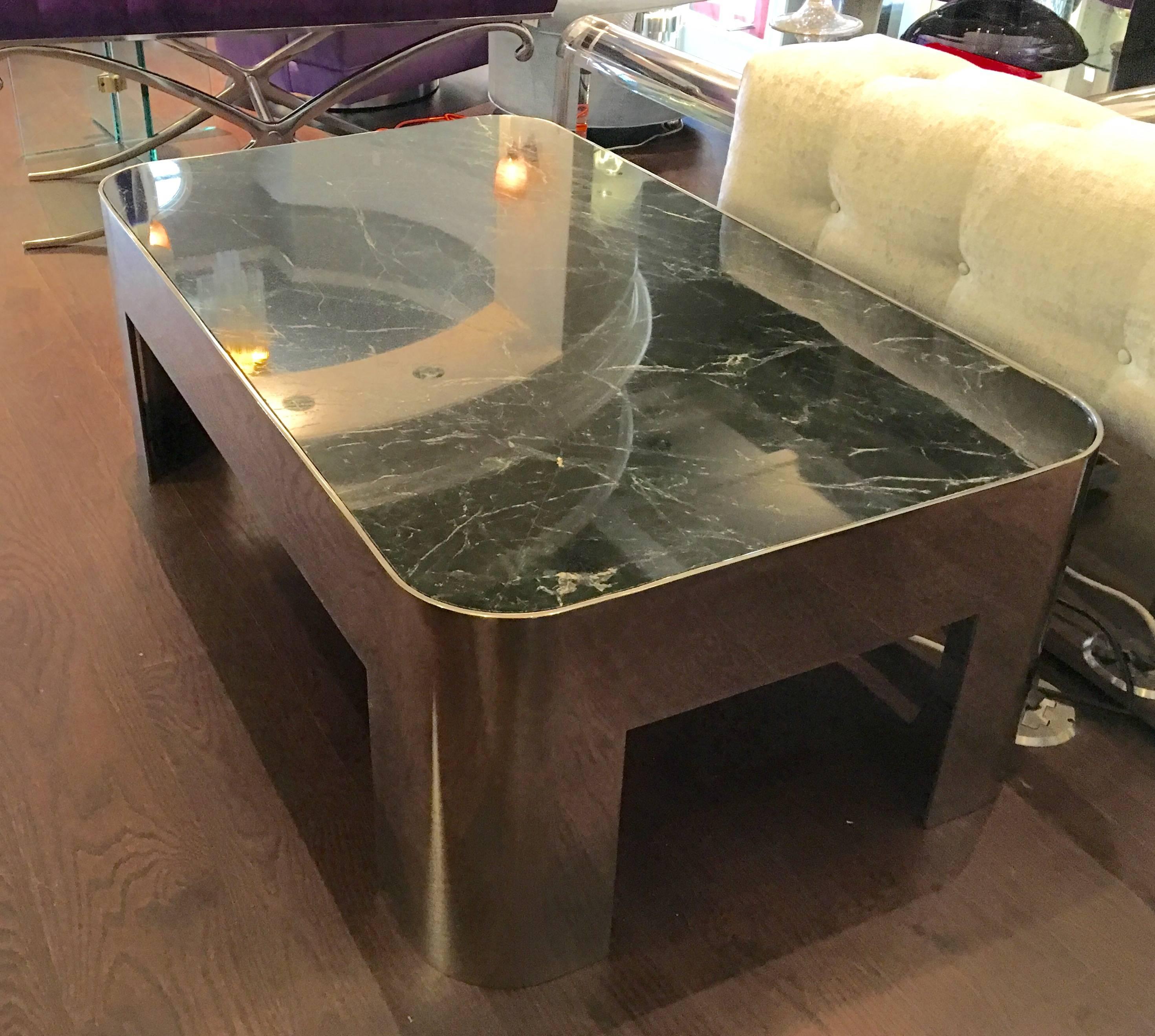 Polished chrome with green marble top coffee table, circa 1980s.