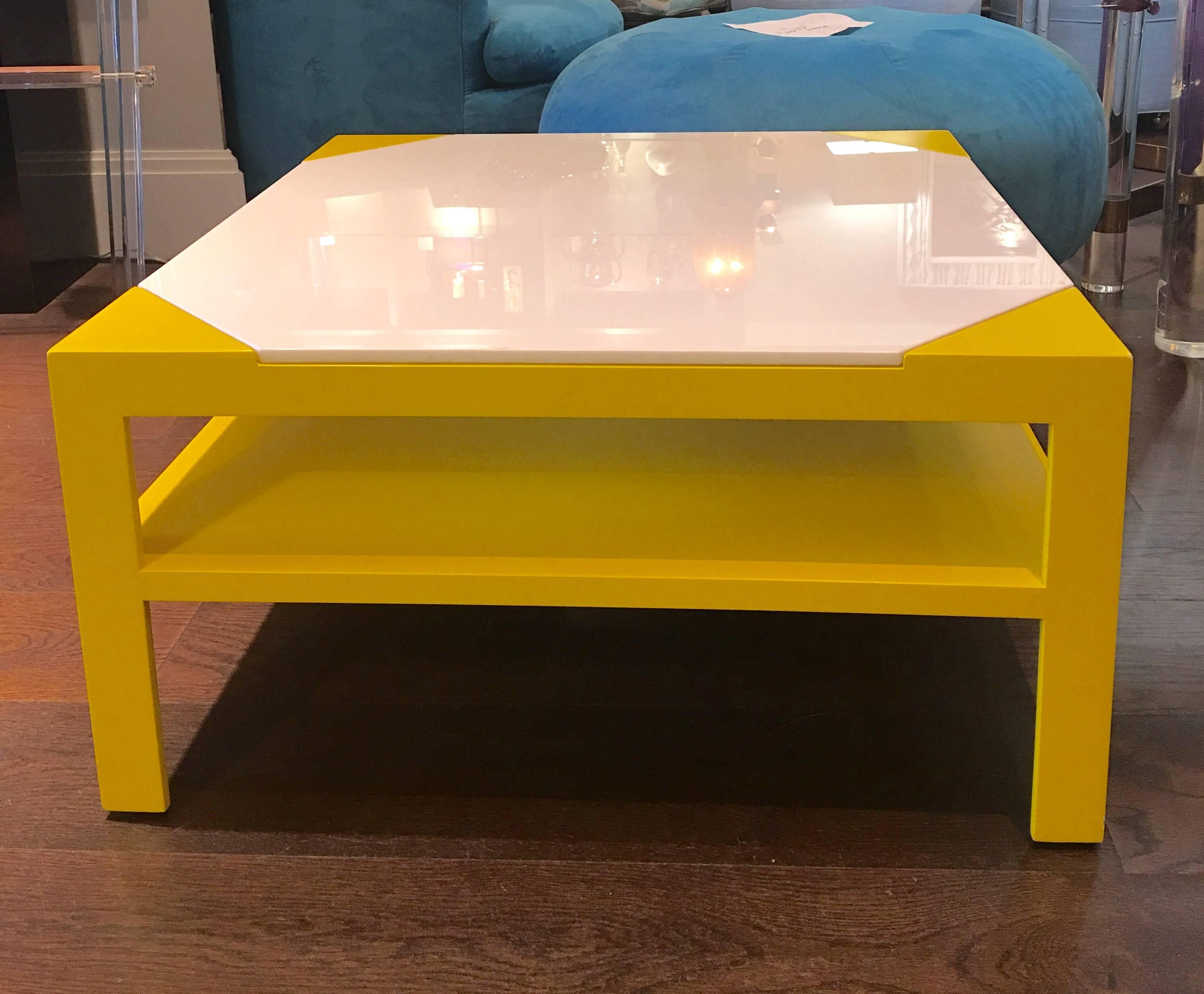 Fantastic yellow lacquered wood table with white glass top by Tommi Parzinger, circa 1970.