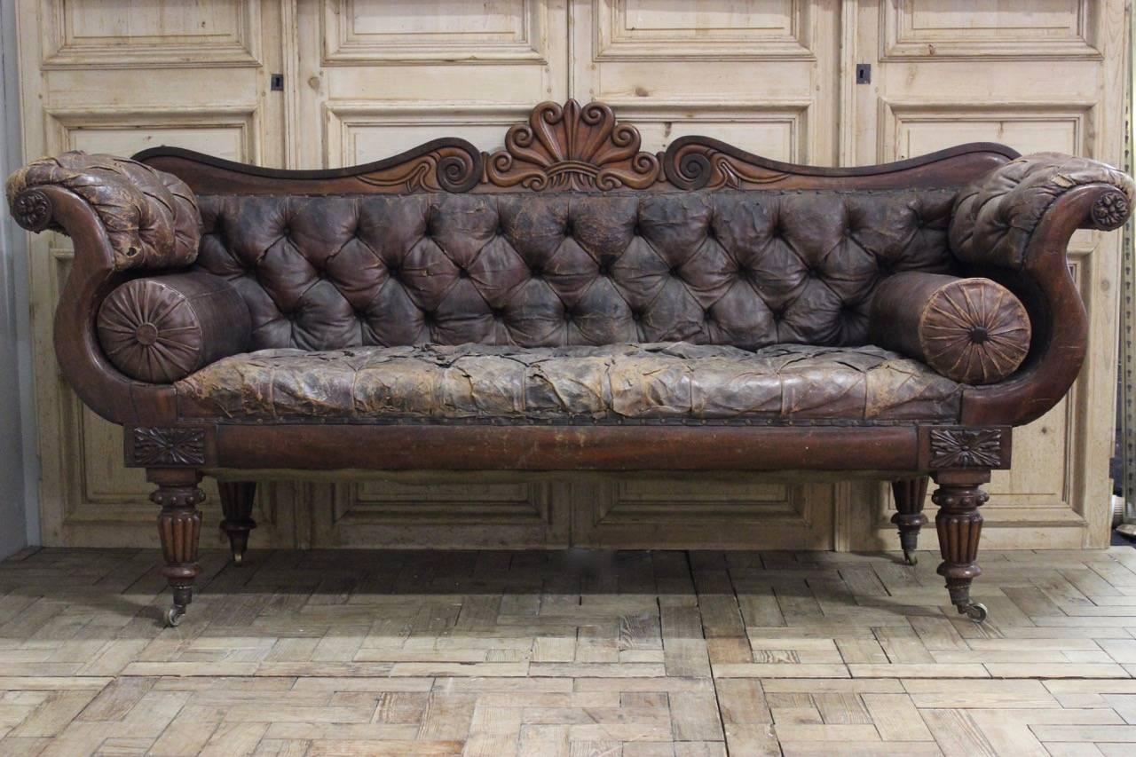 A great 19th century English Country house leather sofa, retaining the original leather, that will make a statement in most settings. 

Please note that this is in its original untouched condition.