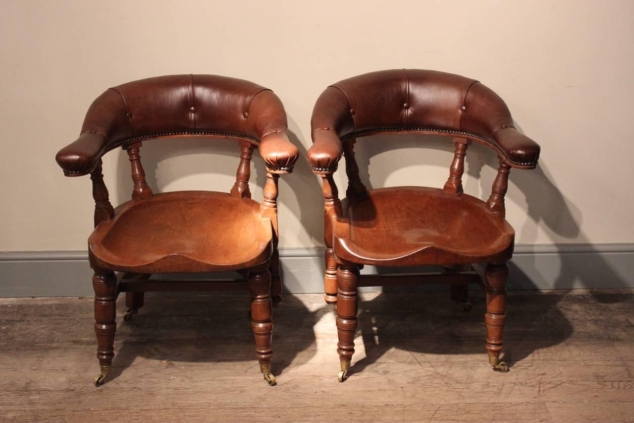 English Great Pair of Walnut 'Captain's Chairs', circa 1880