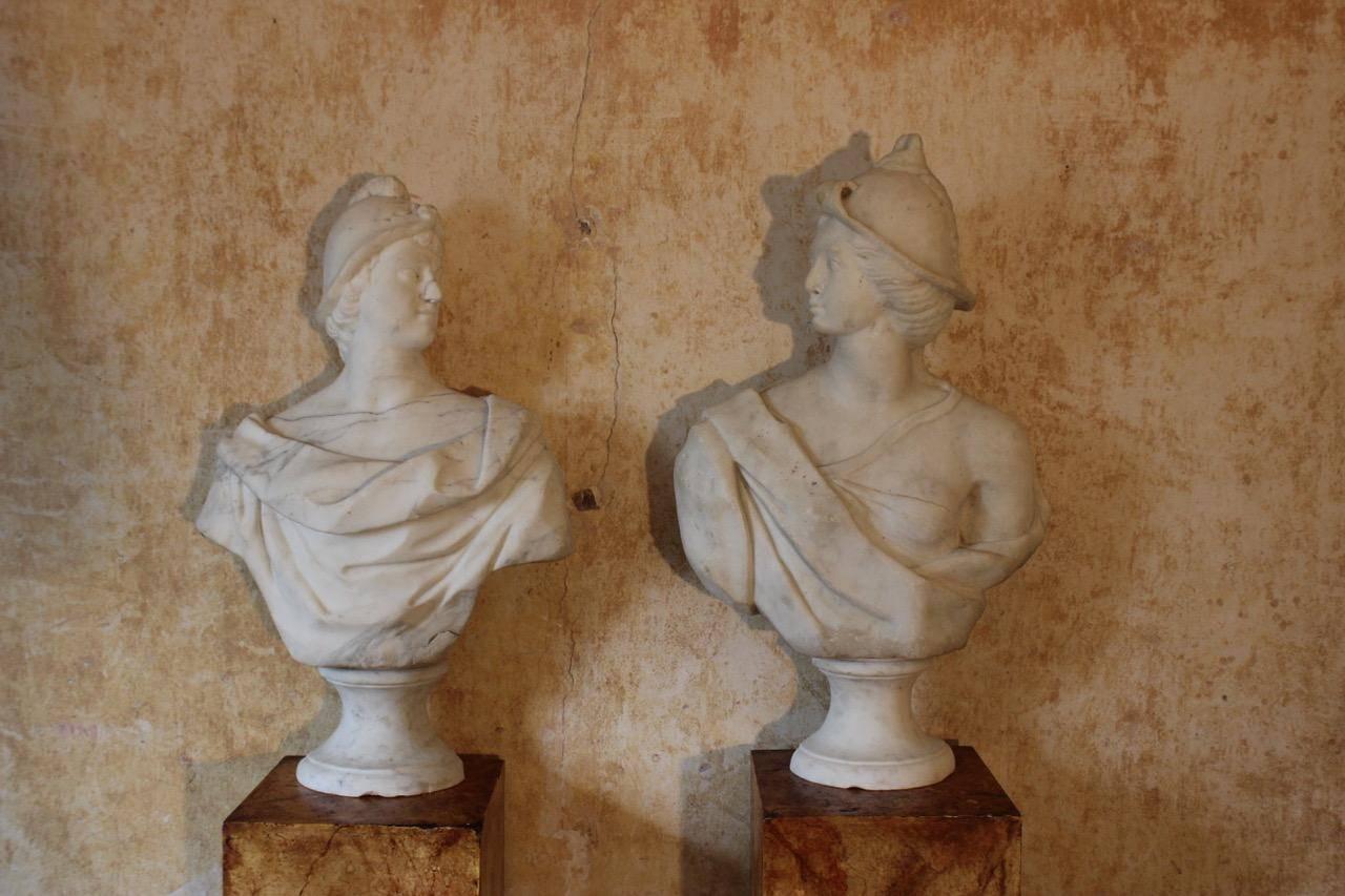 A fine pair of 18th century Italian carved marble busts in the classical taste, that would make a bold statement in a contemporary setting or sit perfectly at home in a period setting. 

Measurements: 78 cm high x 46 cm wide (male) and 81 cm high