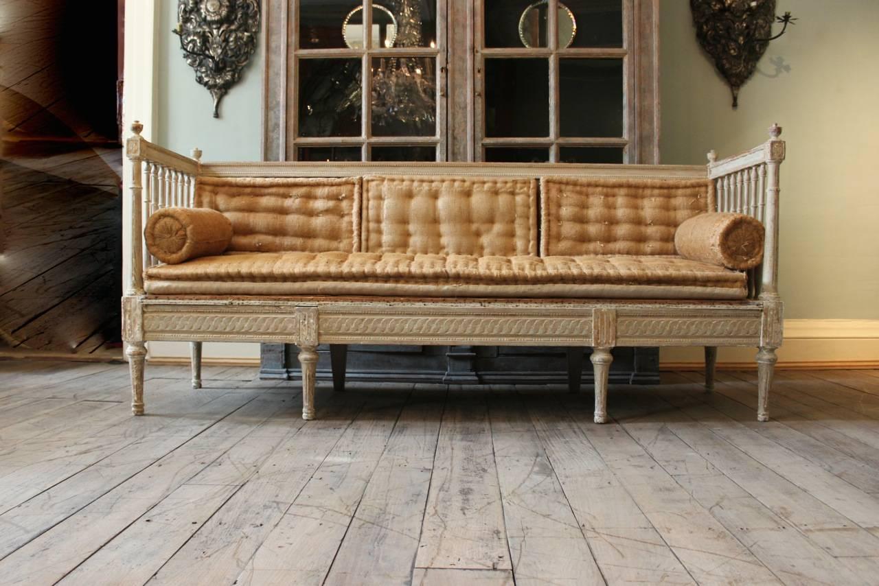 A wonderful, 19th century painted Gustavian Swedish bench, having been scrapped back to reveal the original paint, with the original horsehair cushions.

Beautiful proportions and color. 

Additional measurements: 45.5cm high (floor to
