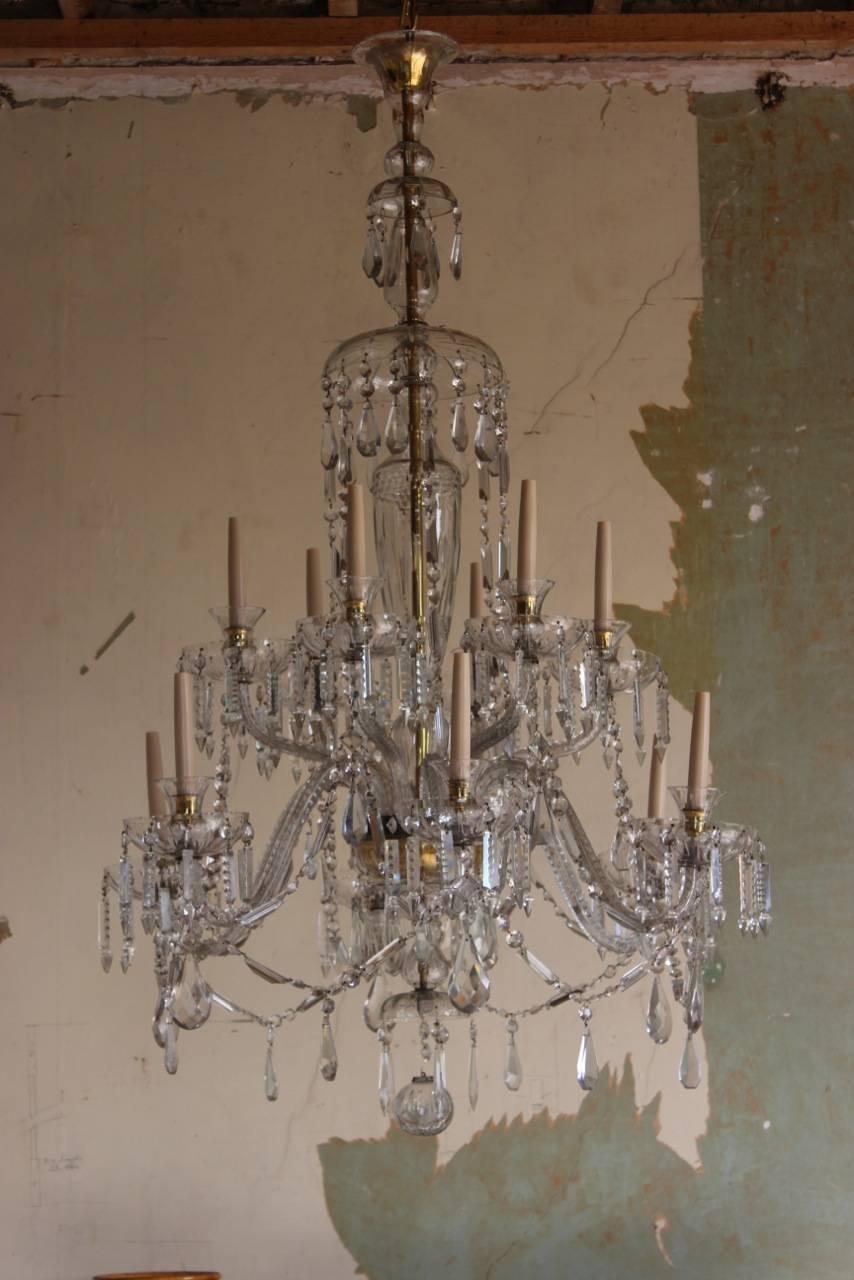 Wonderful, circa 1920s-1930s Spanish glass chandelier of very large size, in the classical taste, with 12 candle lights, having been professionally cleaned and rewired for the UK market. 

This wonderful chandelier measuring a 150cm high, will