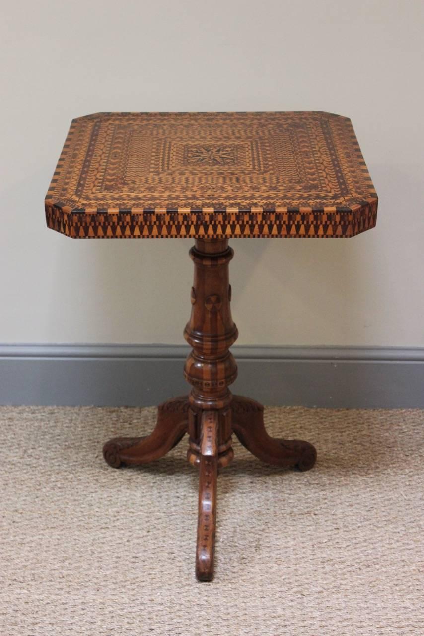 A fine quality, 19th century Italian inlaid, marquetry table. The top lifting to reveal a chest table.