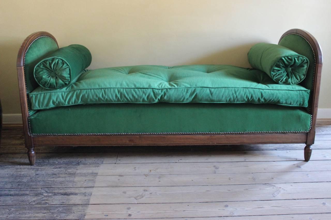 A good quality and very stylish, early 20th century French Art Deco daybed, having been reupholstered by us in a green velvet, that will make a statement in most settings. 
Measurements: 77 cm high x 70 cm deep x 169.5 cm length x 47 cm high (floor