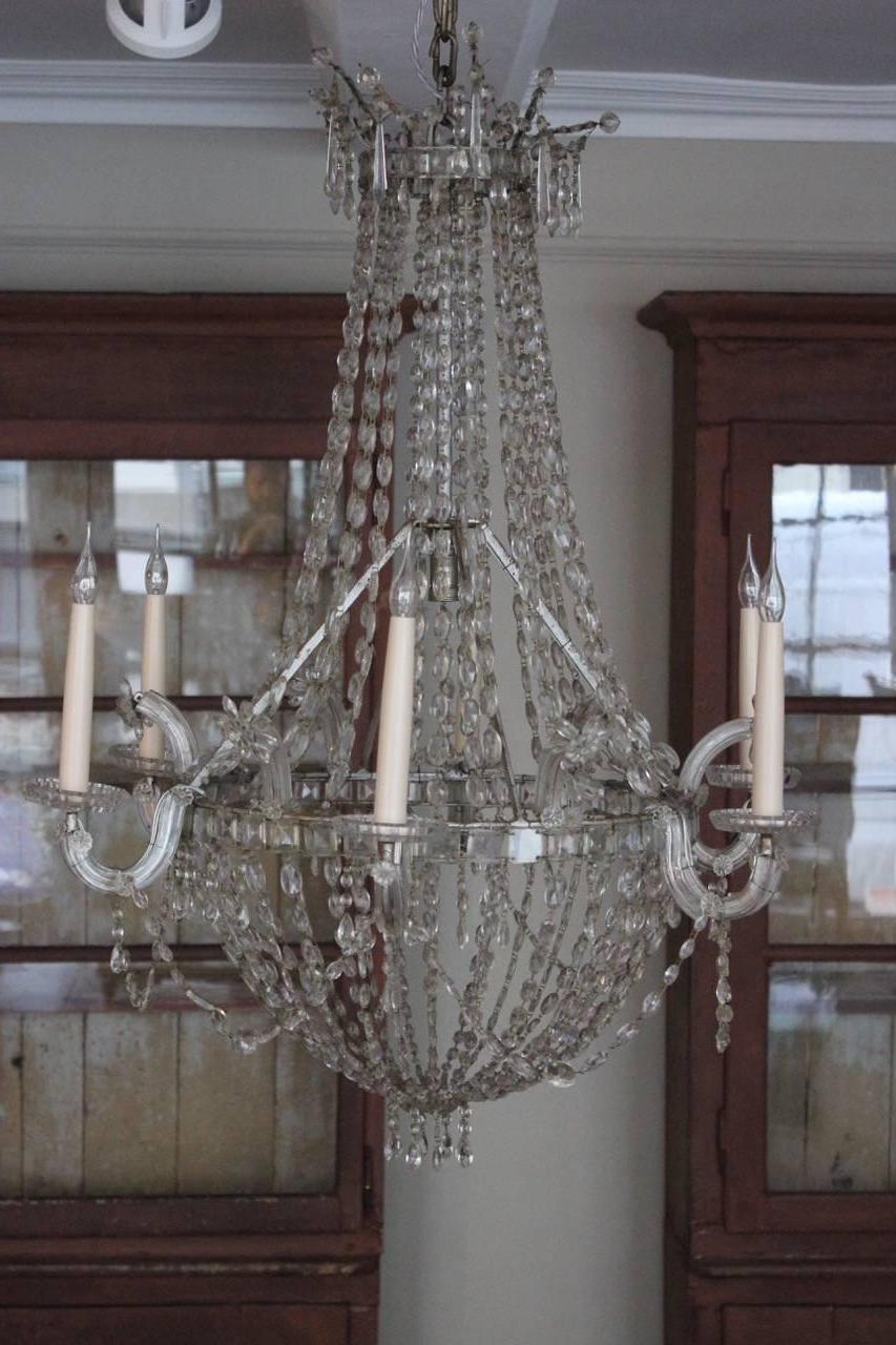 An impressive Spanish six-light chandelier dating to the early 19th century, rewired to current UK electrical standards.