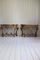 Pair of Italian Rococo Giltwood and Faux Marble Console Tables, 19th Century
