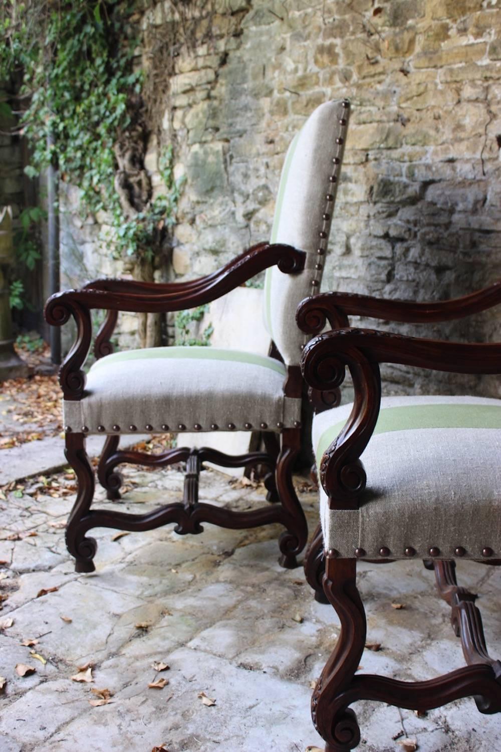 French Pair of 19th Century Louis XIV Style Carved Walnut Fauteuils