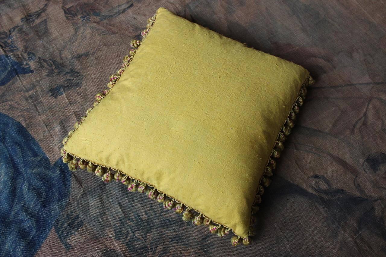 A fine and rare, 19th century French golden-yellow silk damask and fringe cushion, backed with 18th century bourette.