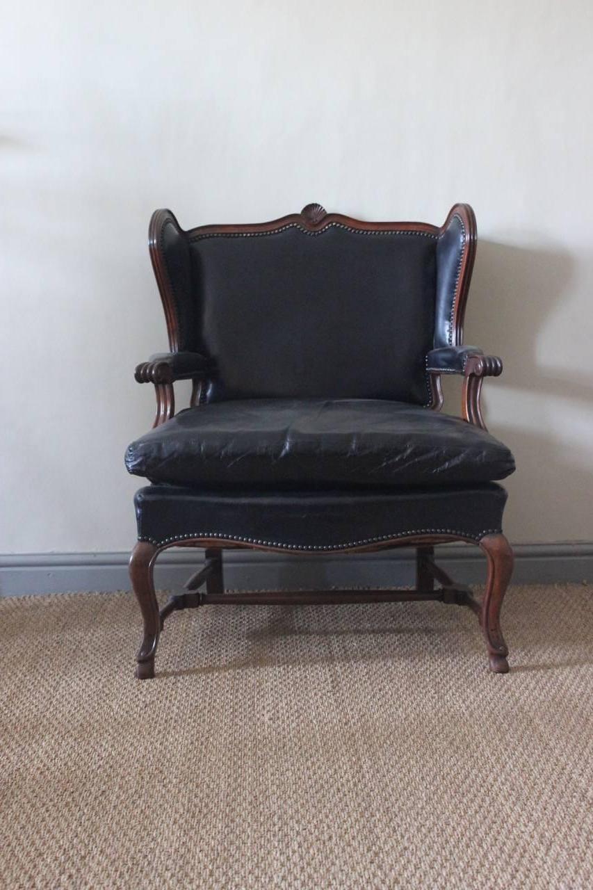 A good and very comfortable pair of circa 1930s French craved mahogany armchairs in black leather, in the 18th century style. 

Measurements: 45 cm High (floor to seat).
 
