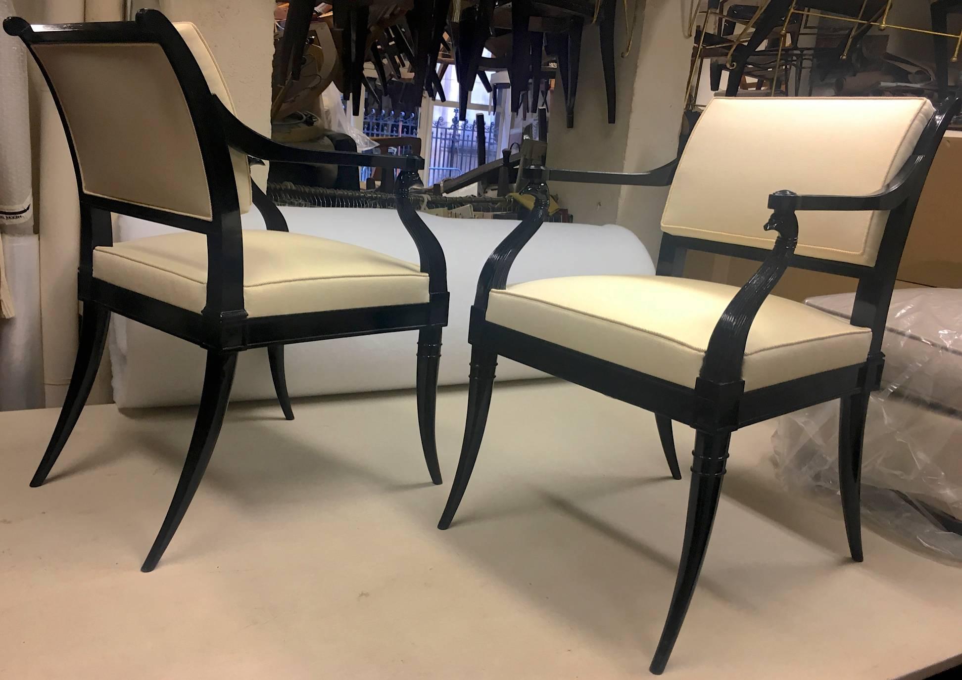 Maison Jansen chicest black neoclassic exceptional pair of armchairs
with Pharos bird arms.