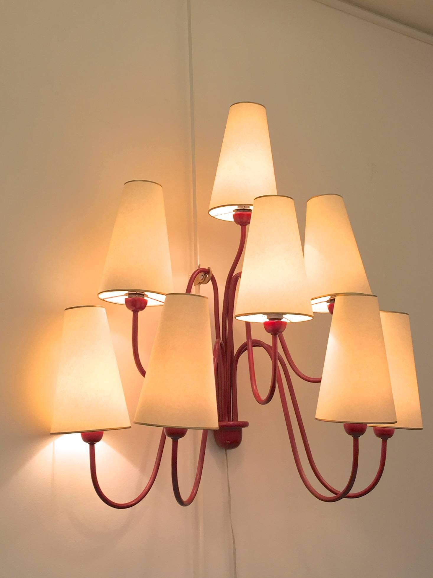 Spectacular Jean Royère red eight-light sconces, model 