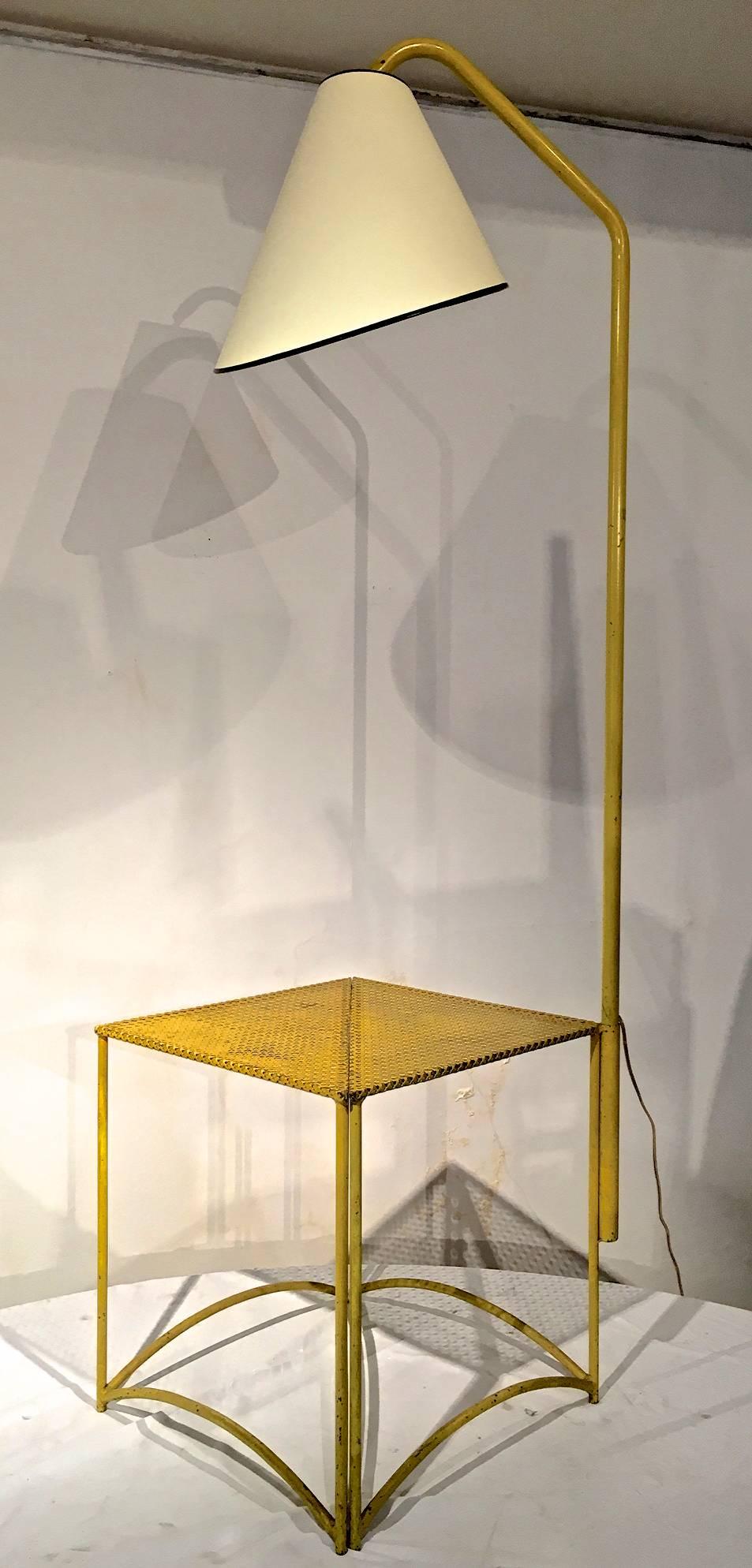 Mathieu Matégot attributed unseen coffee table and floor lamp in perforated iron.