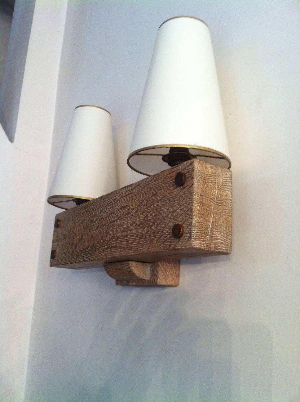 Mid-Century Modern Charles Dudouyt Stamped Rarest Pair of Cerused Solid Oak Sconces For Sale
