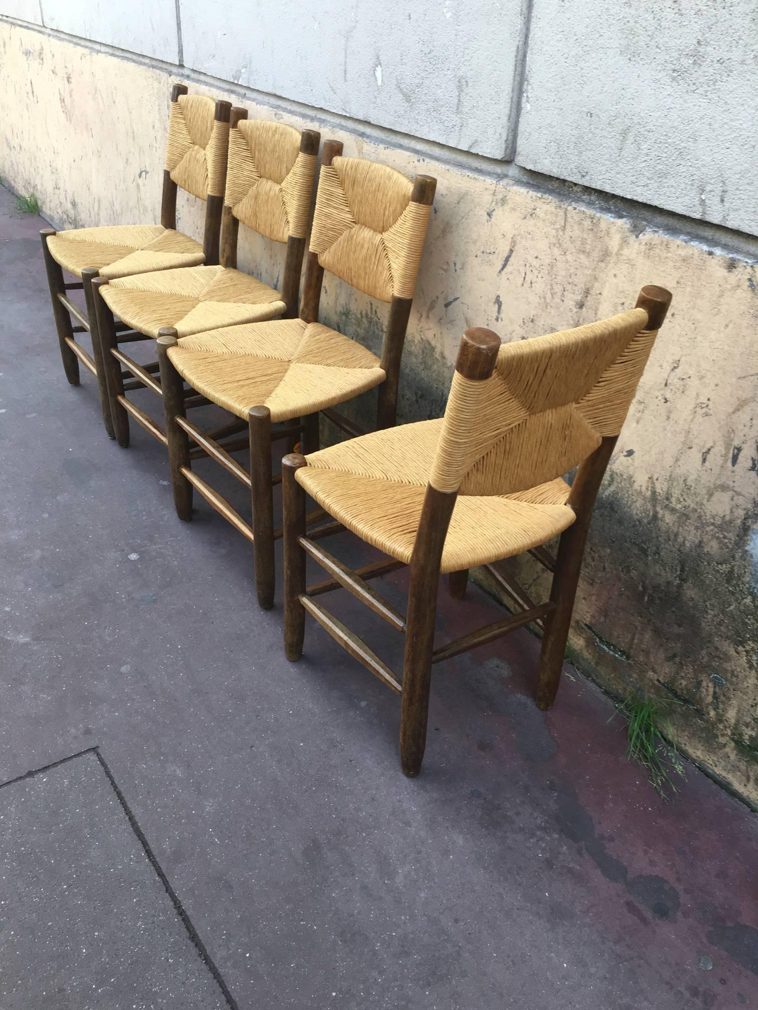 French Charlotte Perriand Set of Four Rush Chairs, Model Bauche, Good Vintage Condition For Sale