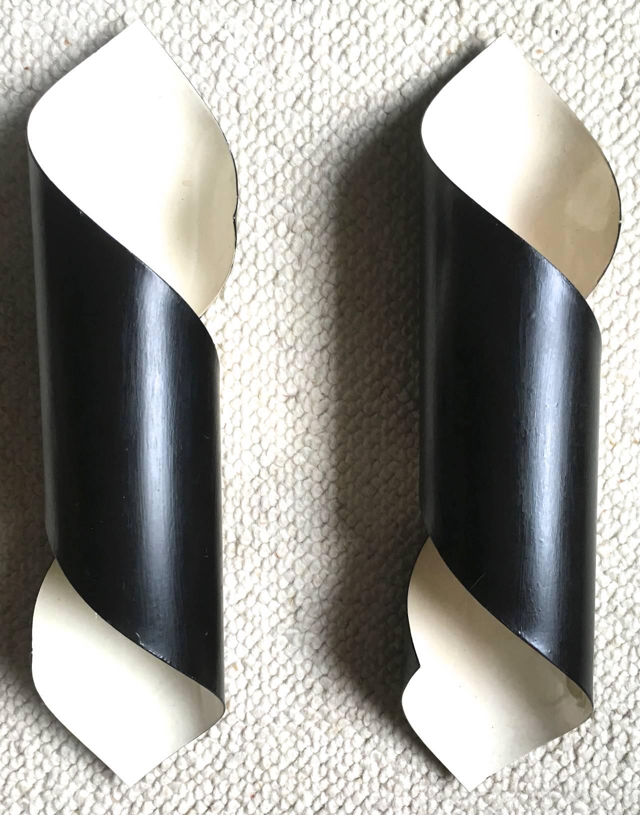 Pair of black tole witty sconces in the style of Serge Mouille.