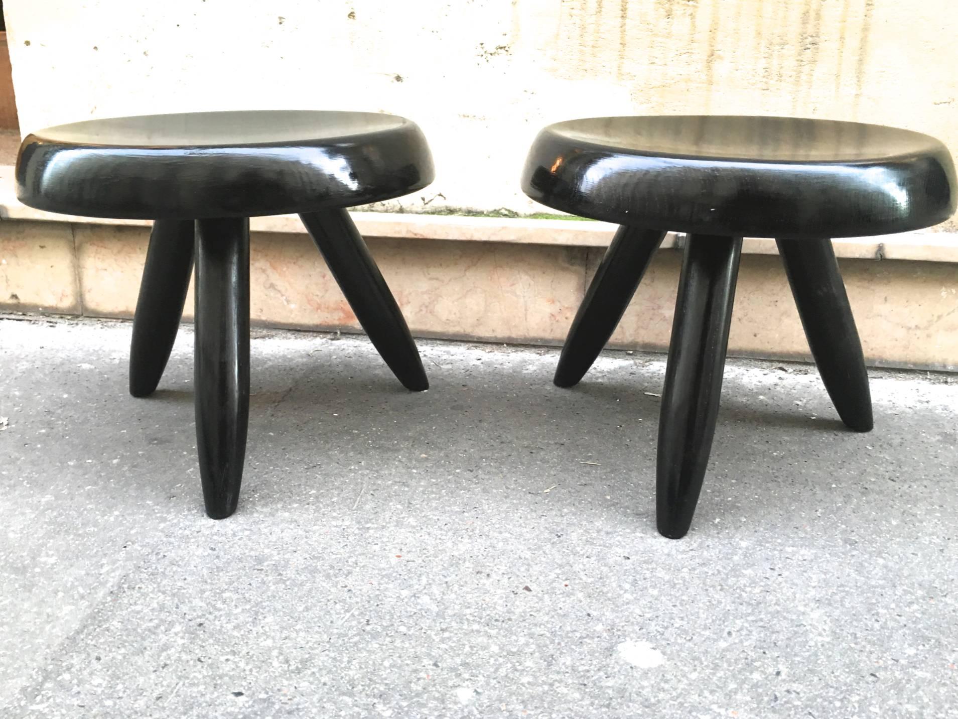 Charlotte Perriand rare genuine pair of black tripod stools.