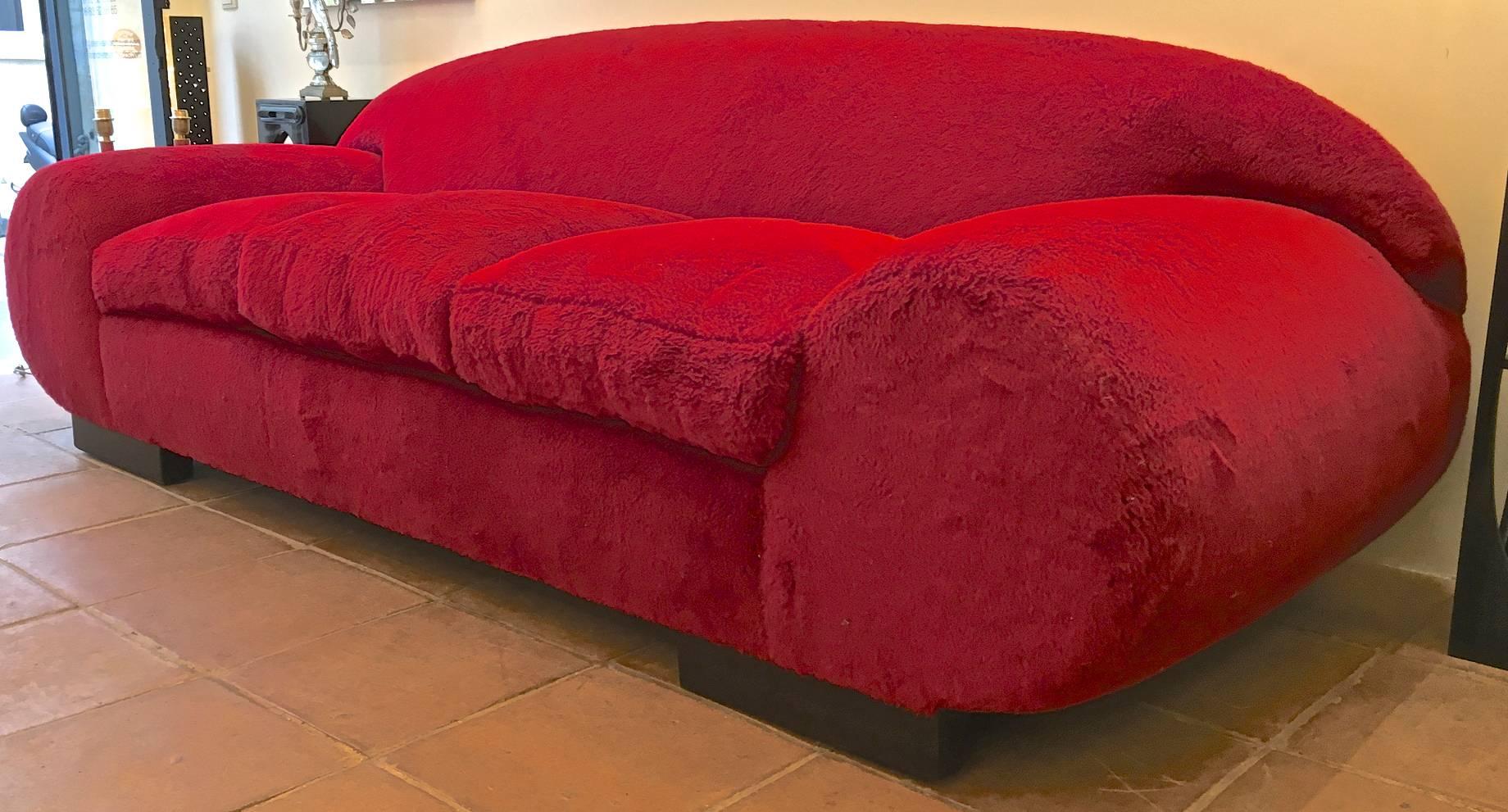 Jean Royère for Maison Gouffé rarest mammoth big documented red early produced couch newly covered in wool faux fur documented in:
Decor d'aujourd'hui n31 in 1938.
Ensembles mobiliers vol 4 1939.
 