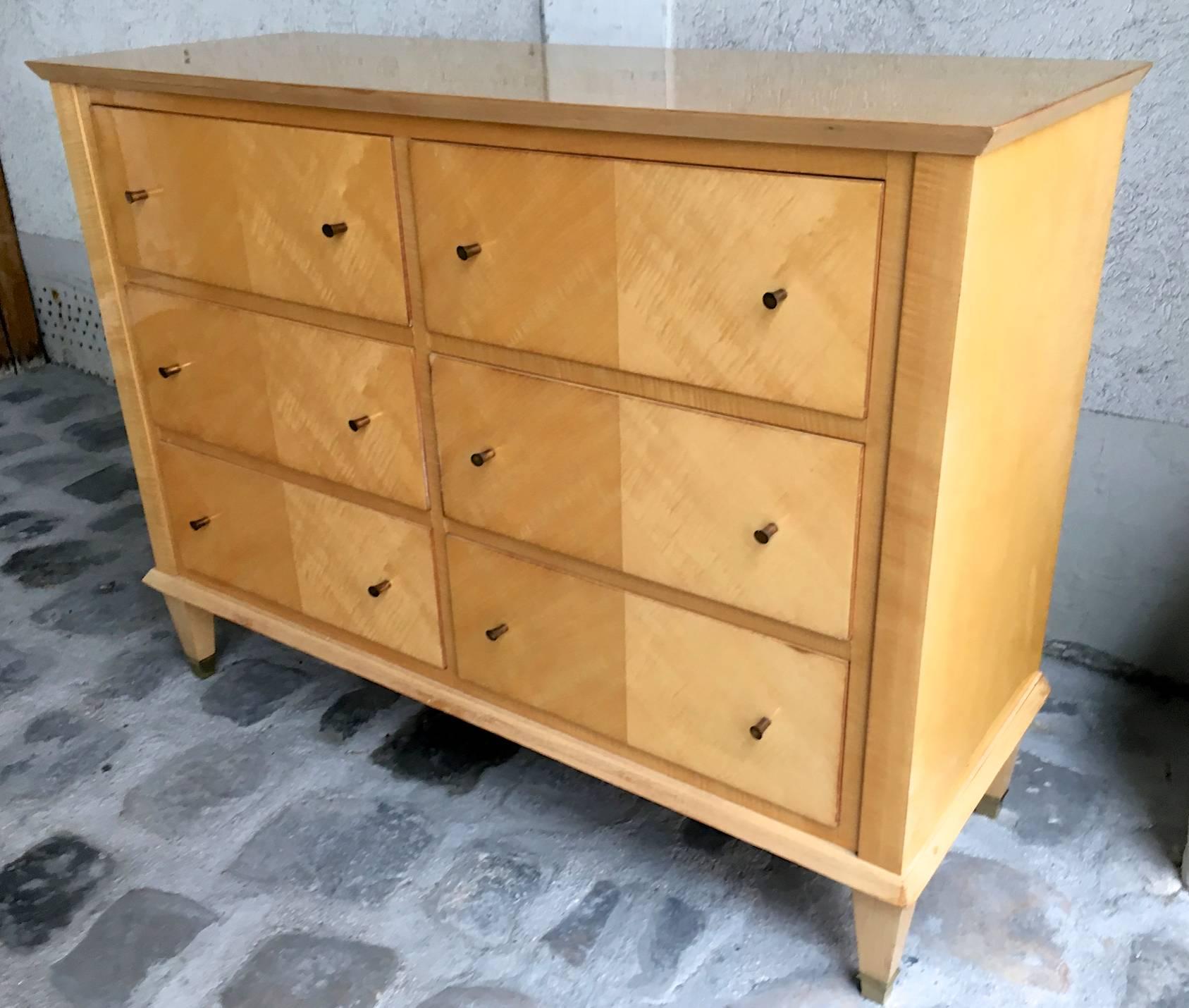 Jacques Adnet sycamore chicest neoclassic chest of six-drawers.