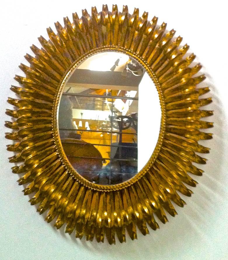 Mid-20th Century French Riviera Superb Oval Gold Leaf Wrought Iron Mirror For Sale