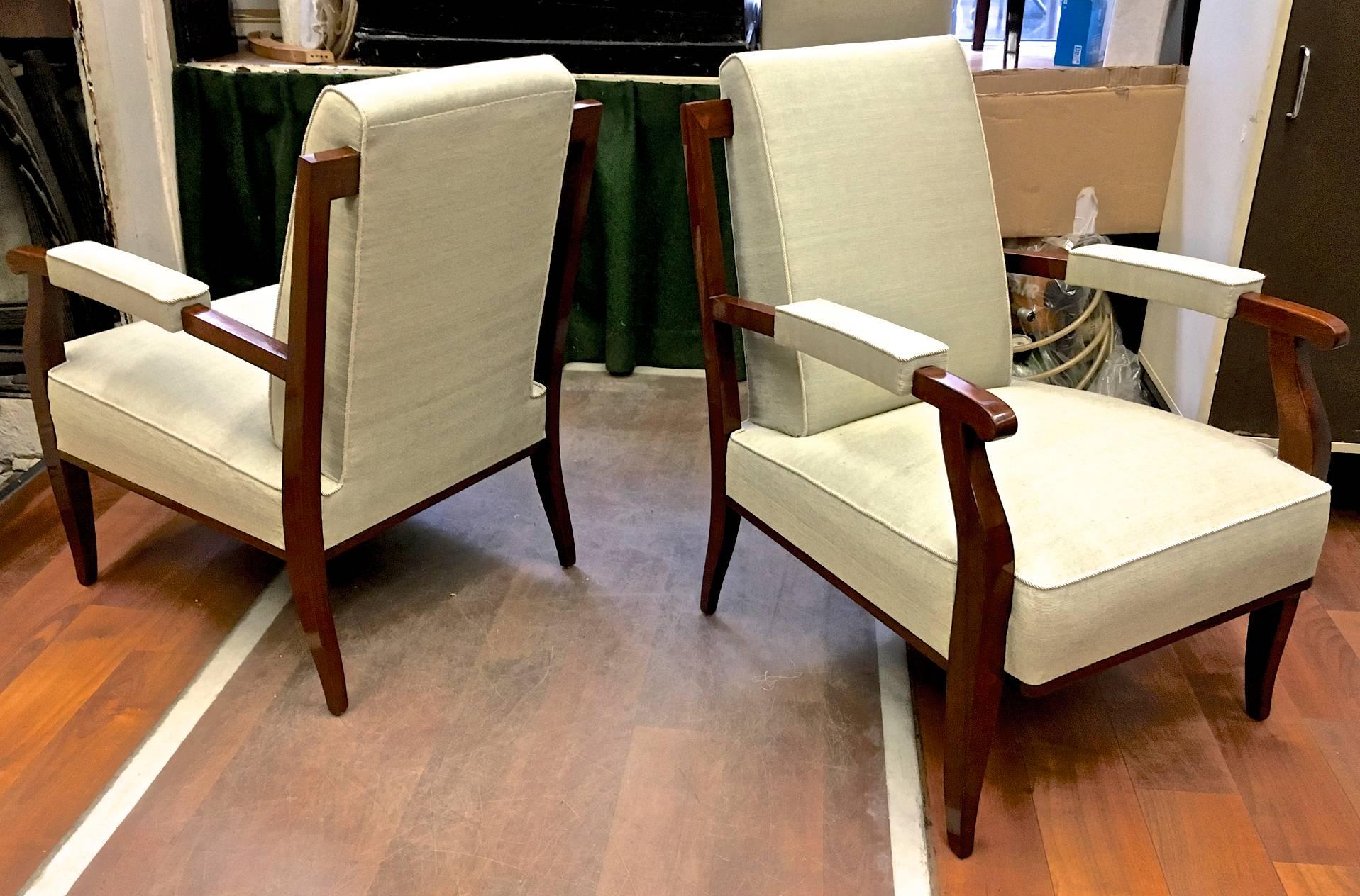 Jules Leleu chicest documented pair of chairs newly covered in silk and fully restored in French polish.
