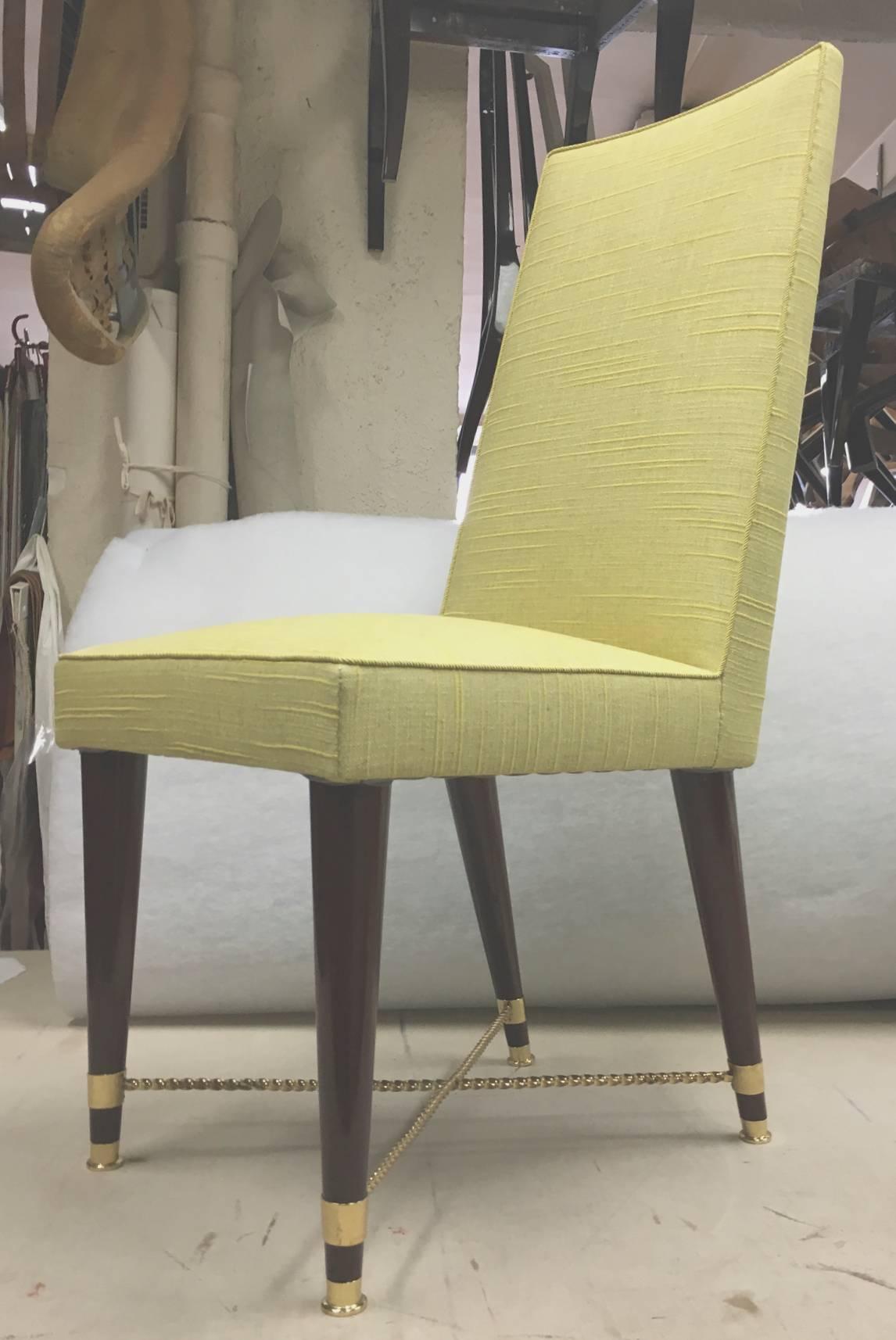 Jean Royere documented exceptional set of chicest eight dining chairs newly covered in pale yellow canvas cloth.