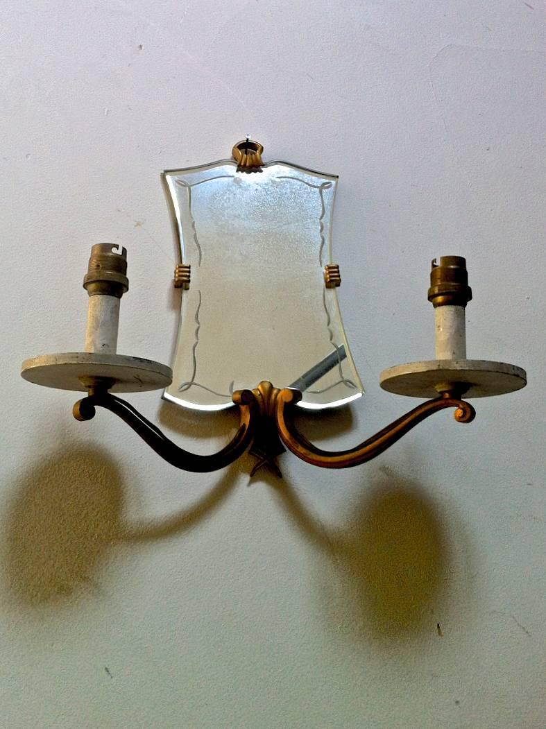 Jules Leleu pair of 1940s refined mirrored gold bronze sconces.