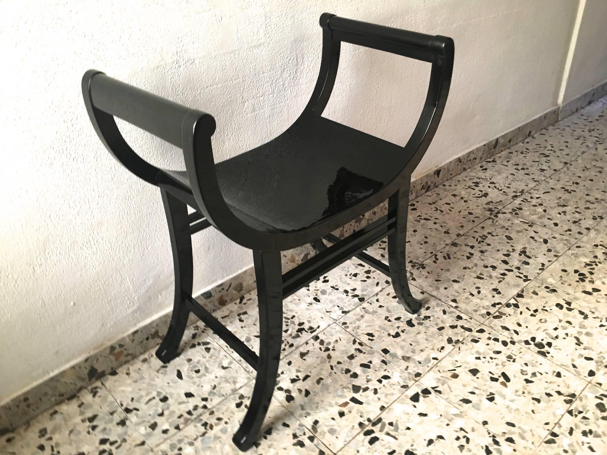 Thonet pair of blackened bentwood curule benches.