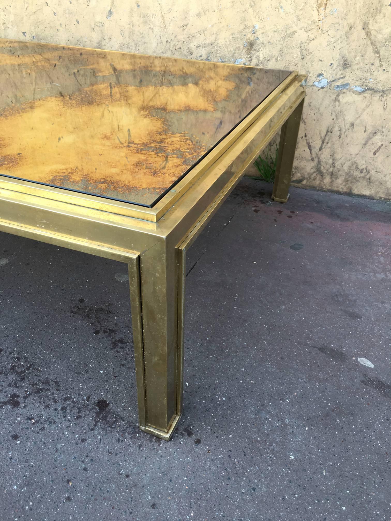 French Jacques Adnet Sturdy Gold Bronze Big Coffee Table with a Gold Leaf Mirrored Top For Sale