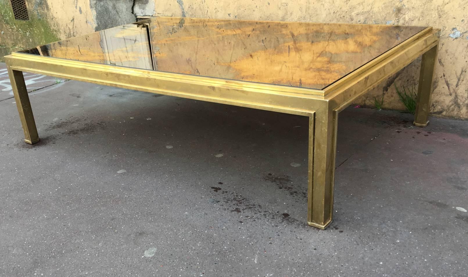 Gilt Jacques Adnet Sturdy Gold Bronze Big Coffee Table with a Gold Leaf Mirrored Top For Sale