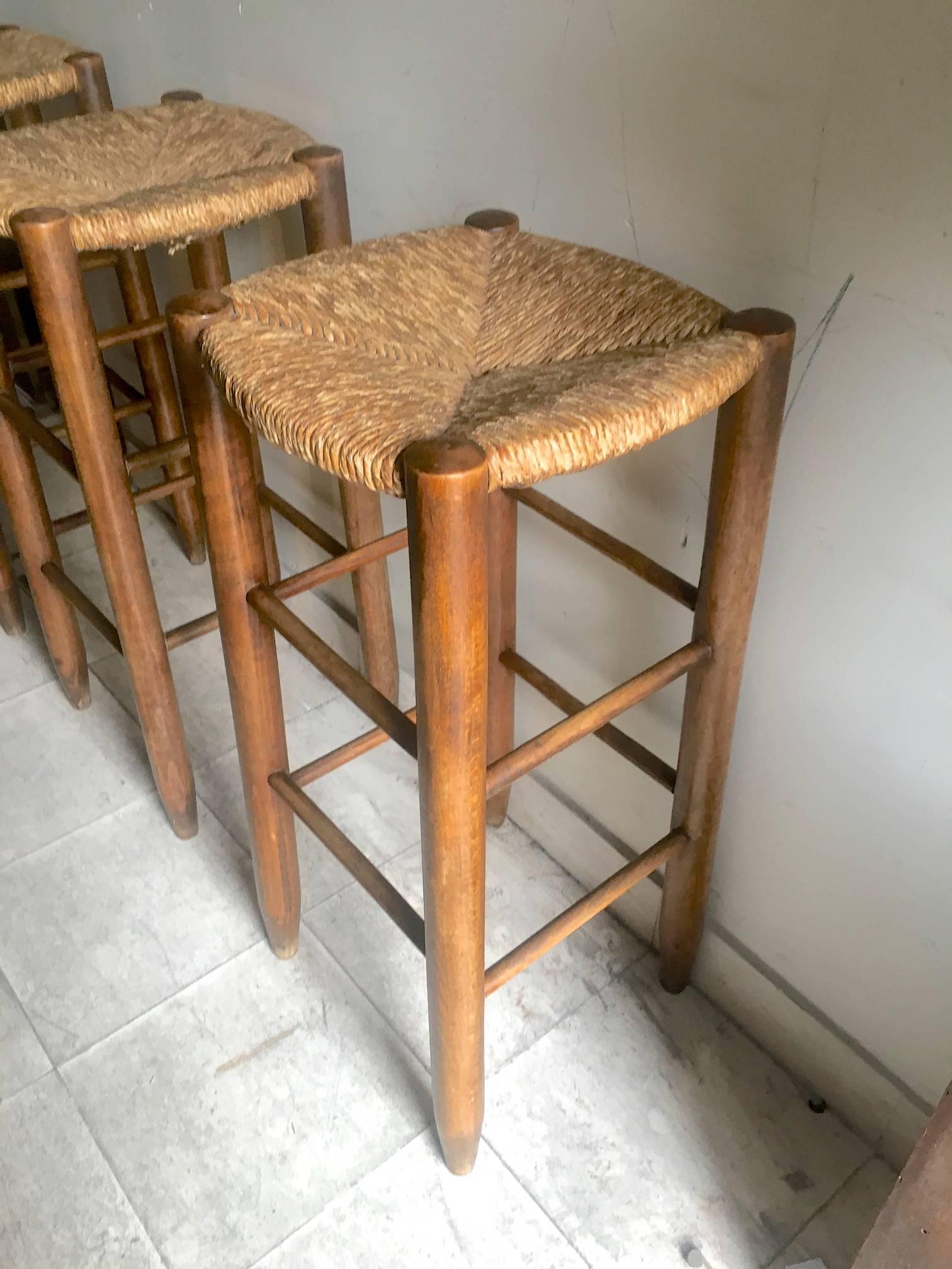 Mid-20th Century Charlotte Perriand, Set of Three Rush Bar Stools, circa 1950 For Sale