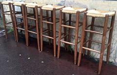 Rare Set of Six Rush Bar Stools in the Style of Charlotte Perriand