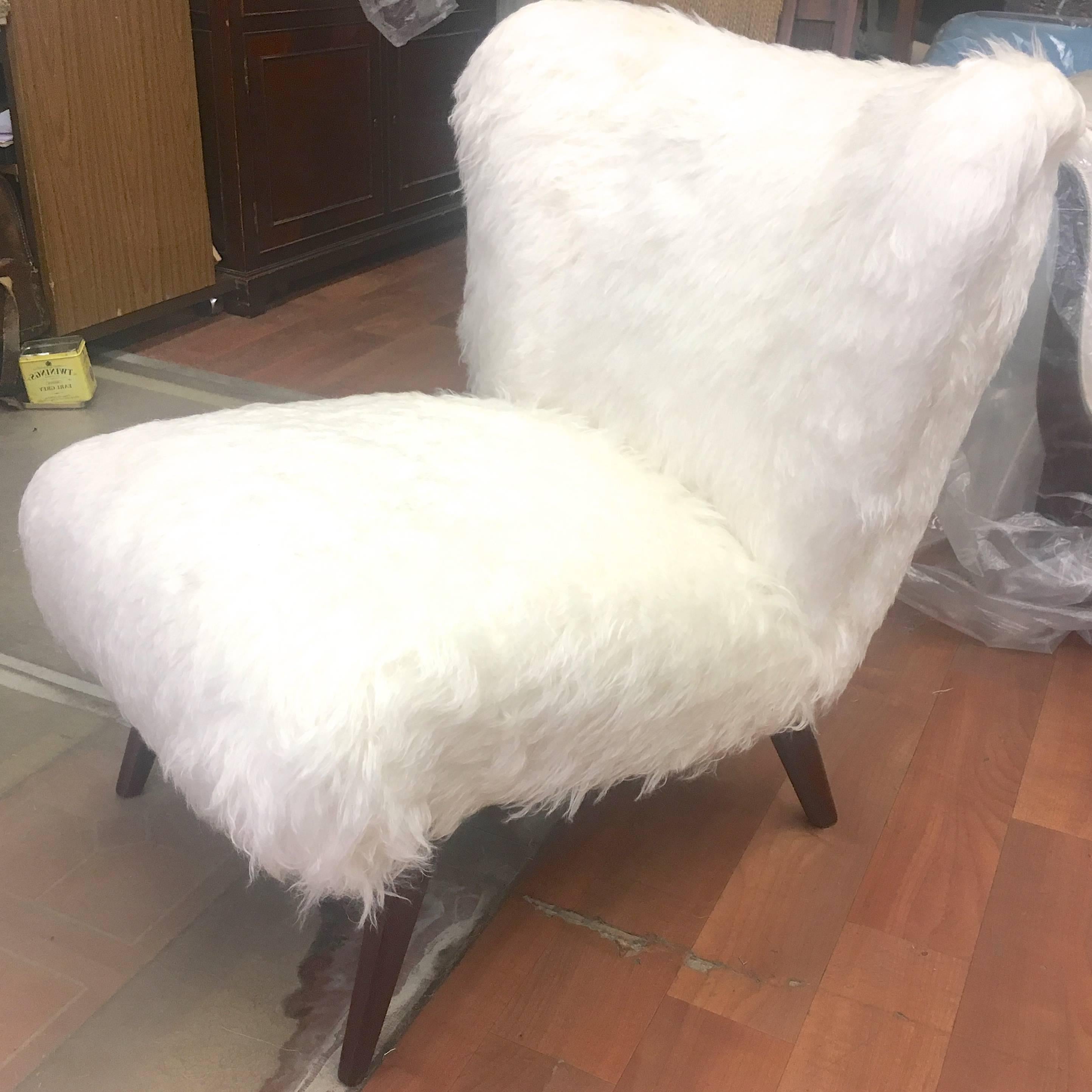 Spectacular Danish pair of slipper chairs newly covered in long mohair faux fur.