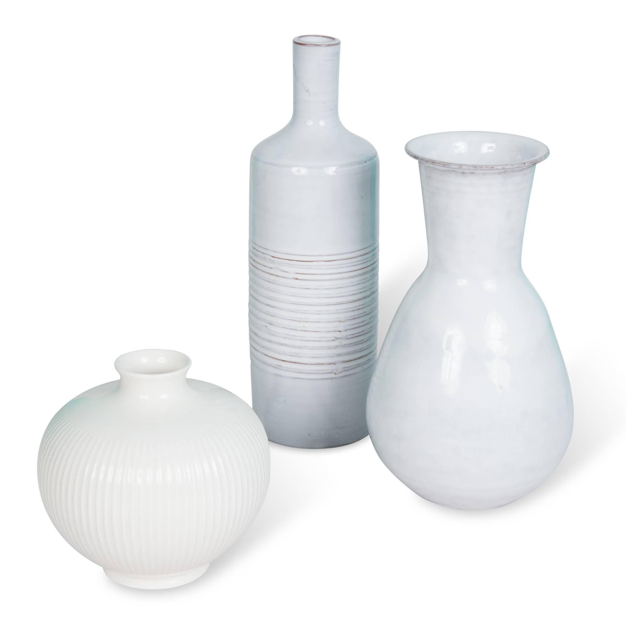 Modern Set of Three White/Off-White Continental Ceramic Vases For Sale