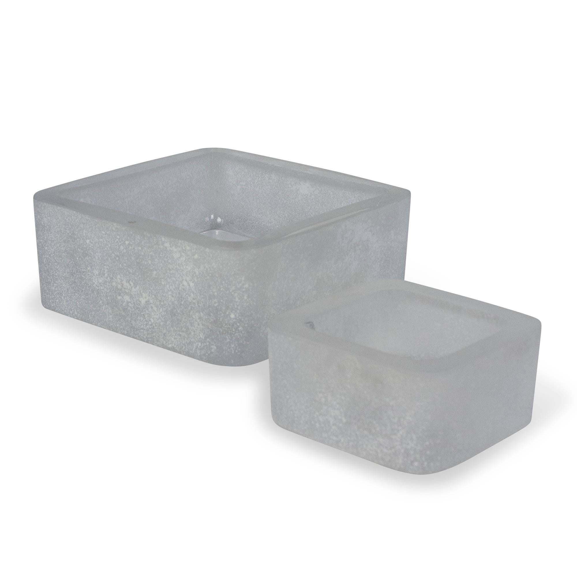 Two frosted glass dishes, square:
 On left: Square white frosted glass dish, with textured sides and insides, by Seguso, Italian 1970s. 2 3/4 high, 7 in square. (Item #2078). 
On right: Square white frosted glass dish, with textured sides, insides