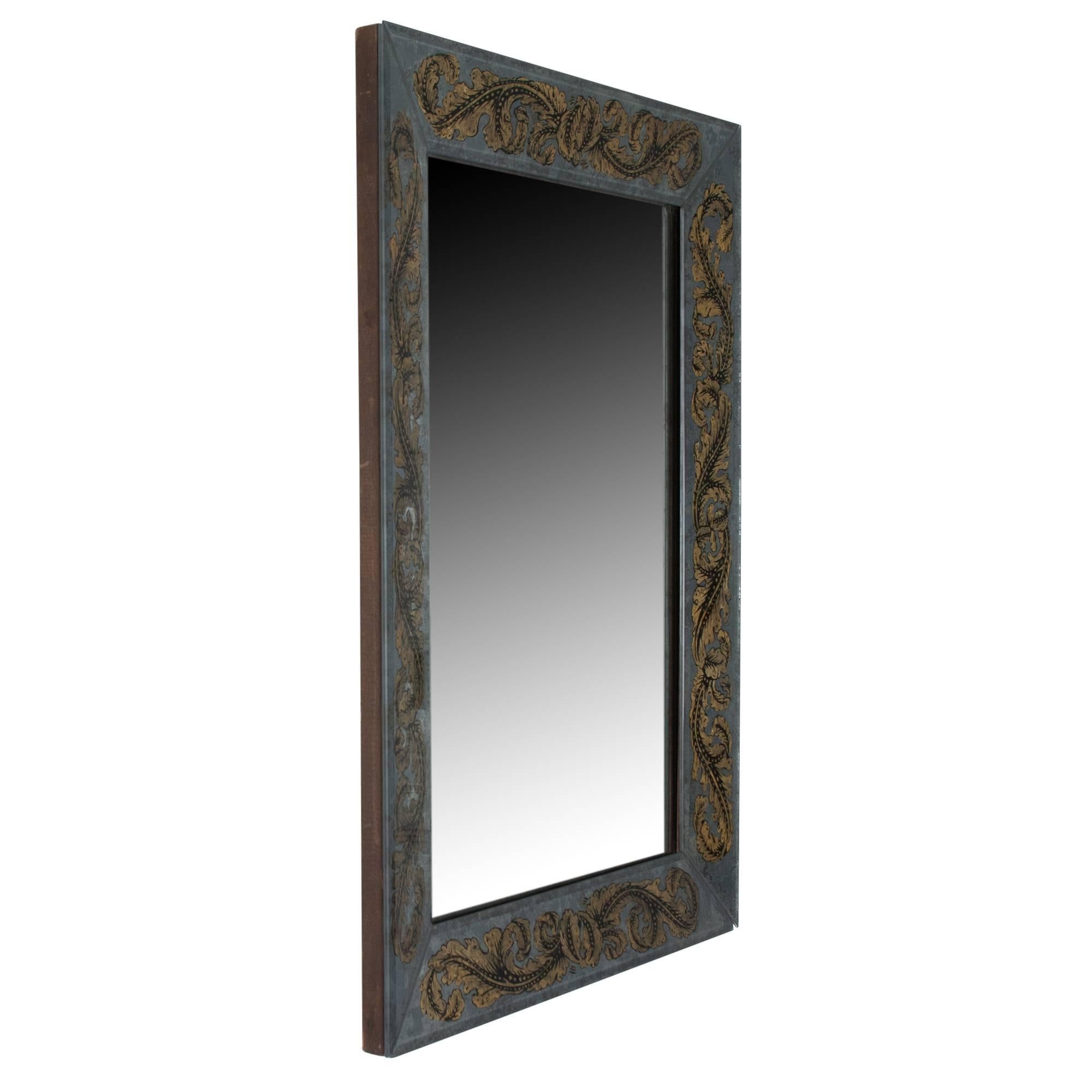 Rectangular wall mirror, antiqued mirror frame with gold foliate reverse painting, central mirror panel with antique spotting by Maison Jansen, France, 1940s. Measures: Height 29 in, width 22 in, depth 1 in.

Note: See last photos of for details