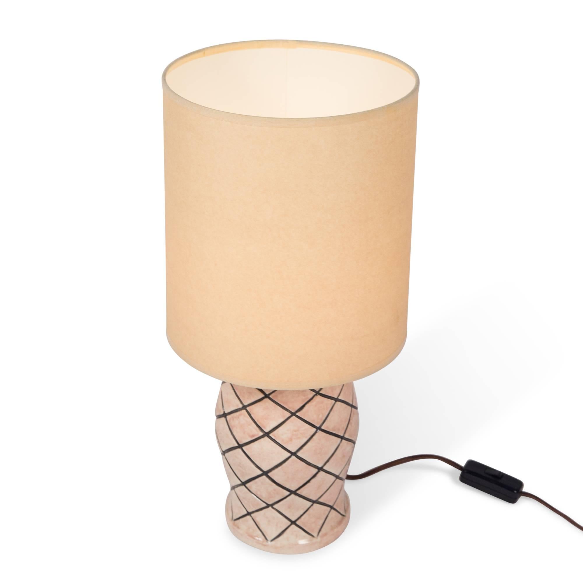 Glazed ceramic table lamp, with black crosshatch pattern, France, 1930s. Signed Nildes. Overall height 18 1/2 in, diameter of base 5 1/2 in. Shade measures diameter 9 in, height 10 in.
