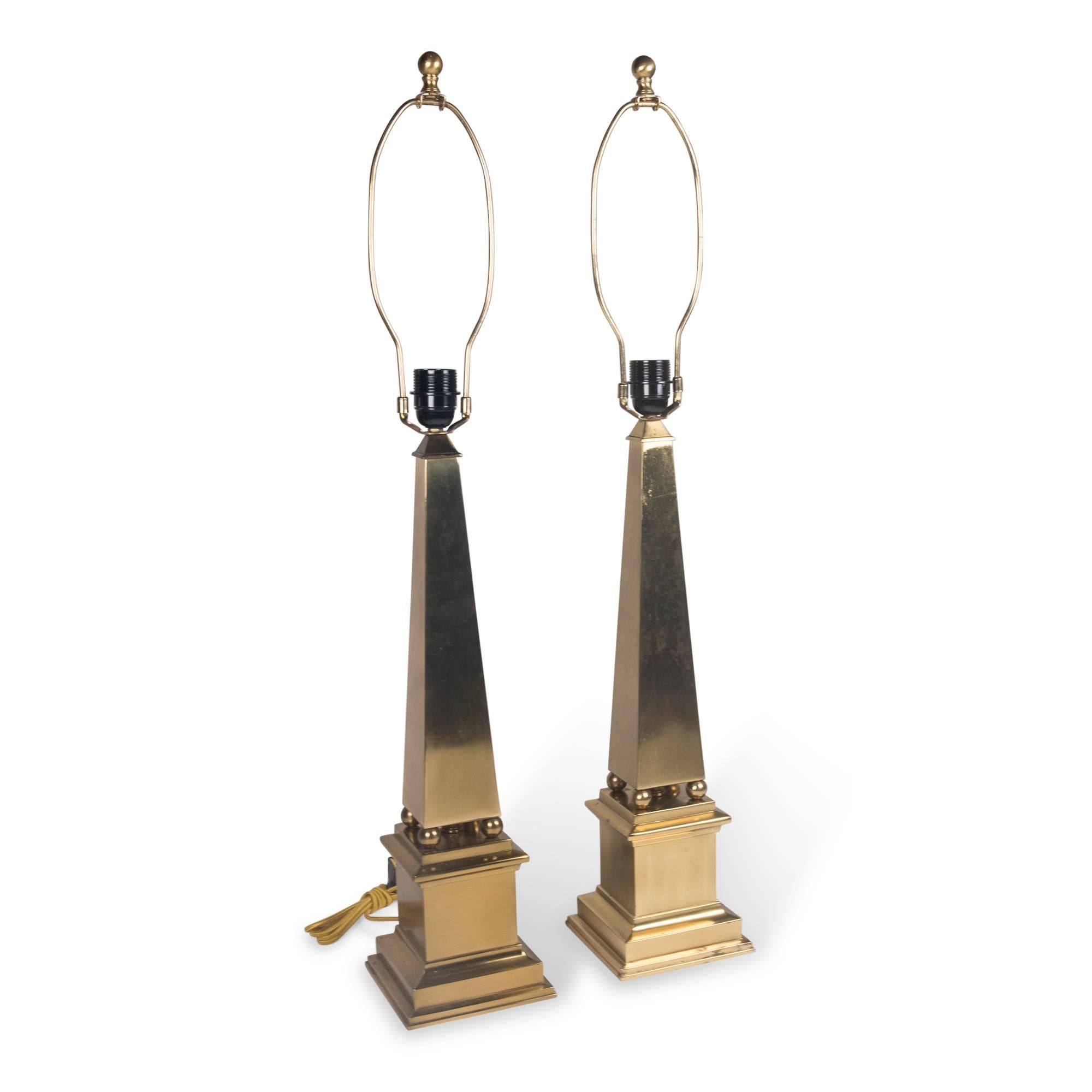 Brass obelisk form table lamps, tapered body on square base, with ball accents and finials, by Marbro, United States, early 1960s. Measures: Height to top of finial 32 in, height to top of socket 23 1/4 in. Base measures 6 in square.